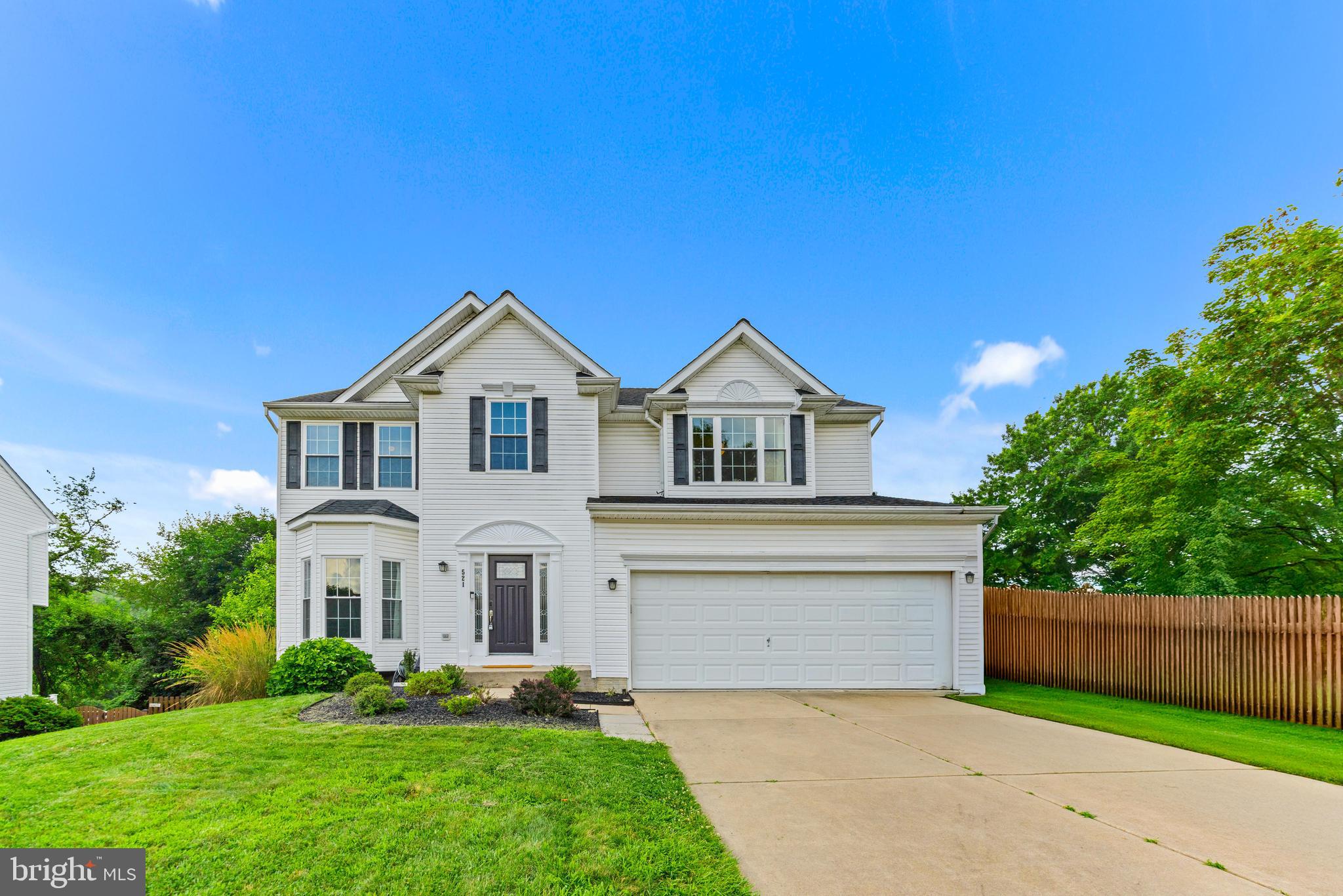 Absolutely incredible home, updated from top to bottom! This pristine and meticulously maintained colonial features a gorgeous kitchen renovated in 2024, boasting granite countertops, stainless steel appliances, upgraded cabinets, backsplash, and island! This beautiful kitchen also features a kitchen workstation and chic, custom pantry doors. The kitchen flows into a large family room, which features a gas fireplace and offers enough space to gather with family and friends comfortably. The whole main level flows beautifully together with elegant hardwood flooring. On the main level you'll also find an elegant formal living room, a spacious dining room, a half bath, and the entrance from the two-car garage. Go up the stairs and you'll find an inviting primary suite, which features cathedral ceilings, a walk-in closet, and a beautifully renovated primary bathroom. The primary bathroom includes both a soaking tub and a walk-in shower, not to mention an attractive double vanity sink. Also upstairs are three additional bedrooms, a second full bath updated in 2024, and the laundry room. In the finished basement, there is a large recreation room perfect as a second family room, a playroom, an exercise room, or an office. There is also a utility room in the basement, plus a rough-in for a bathroom if the new owners wanted to add a basement bath. There is a sliding glass door from the basement out to the patio, which boasts a spacious sitting area. There is an additional seating area beneath the deck, as well as a fenced-in grassy area for playing or for pets. The yard offers a bit of extra space in its side yard since it's at the end of the street. If more space is desired, the home also backs to a big grassy open space perfect for sports or group activities. Off the kitchen, French doors lead to the newly renovated deck (2024), which features vinyl railings and composite decking that will never have to be replaced. There are stairs from the deck down to the rest of this beautiful backyard. On top of all of these updates and upgrades, the sellers have updated virtually every system in the home! The roof was replaced in 2019, the furnace was replaced in 2024, and every window in the home was replaced in 2024! With over $150,000 of upgrades and updates, the new owners are walking into a like-new home ready to meet their needs for a lifetime. Come see this one as soon as possible because it won't last long!