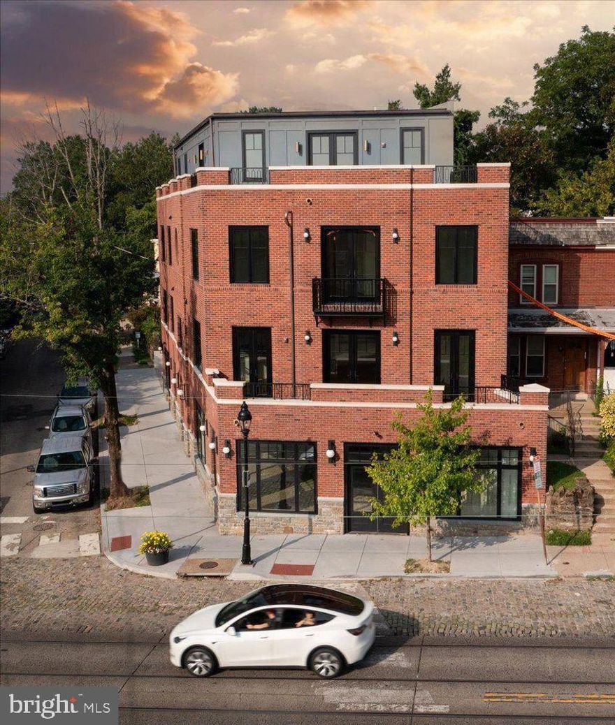 The perfect blend of boutique living, luxury comfort and instant village access awaits at 8100 Germantown Avenue. This new construction jewel provides timeless amenities and contemporary flair amongst the exquisite architecture in Chestnut Hill, Philadelphia’s Historic Garden District.

Located on the 3rd & 4th floor, The Wissahickon Suite is a nearly 3,600 sf bi-level three-bedroom, three-and-a-half bath penthouse with a private elevator entrance. Ideal for ultimate exclusivity, the home's first level showcases three generously sized bedrooms that each enjoy the use of ensuite baths. The lavish primary suite features a sitting area, personal balcony, spacious walk-in closet, and a luxurious bath with a dual vanity and glass shower. This level is complete with a generous laundry room with a side-by-side washer and dryer.

Perfect for entertaining, the highest level provides access to a sprawling roof deck with beautiful views of “The Avenue” and the stunning greenery of the Wissahickon Valley. The spacious living room has a wet bar, ideal for mixing up cocktails and hosting guests. Overlooking the separate dining area, you’ll find a chef’s kitchen with a large center island, including seating for six. Southwest natural light pours in from three sides drenching every room with bright warmth.

Additionally, the apartment is exceptionally soundproof, featuring the highest quality doors, windows, and insulation available. This ensures a peaceful living environment right in the heart of the village.

The front door is just steps away from the excellent shops and all the conveniences within the village of Chestnut Hill. Lovely restaurants, cozy cafes, serene parks, excellent schools, and public transportation options are within easy reach. Enjoy private off-street parking, high-end modern efficiencies and maintenance-free living in the heart of Philadelphia’s most sought after neighborhood. Don’t miss out on the unique opportunity to make this incredible home your own.