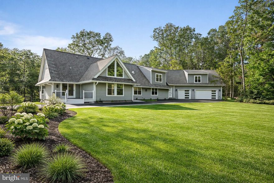 This fully remodeled Modern Ranch at 10900 Hunter Station Rd on almost 2 acres showcases sophisticated design and exceptional craftsmanship. The home has just undergone a remarkable transformation that includes huge addition with 3 car garage, meticulously renovated to create a perfect blend of modern luxury and elegance. Spanning 3 beautifully designed floors, this nearly 7,400 square foot Vienna home offers 4 bedrooms, 3 bonus rooms and 7 full bathrooms. With those attributes alone, it’s already a highly sought-after residence, but its distinctive designer features truly elevate it to a league of its own including a sophisticated eat-in kitchen and a huge primary bedroom suite with customized walk-in closet. State of the art 3 car garage offers high end flooring with all recessed lighting and car charger. Harwood floors throughout the upper two levels with and all custom closets. Behind-the-scenes upgrades include all updated systems, laundry area with washer and dryer units and two master bathrooms with free standing tubs. Please find floor plans in the documents section of the listing. Experience modern living at its finest in this exquisite Vienna residence. Great location 1.5 miles from the W&OD, nearby access to a number of greenway trails and streams. The trail network connects to the CCT. 4 miles from the Vienna Metro/Orange line, just 9 miles to Dulles International Airport. Close proximity between downtown Vienna and Reston Town Center.