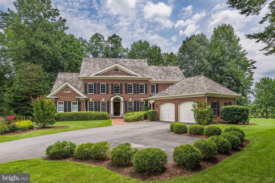 Sited on over half an acre on a cul-de-sac and backing to the 6th green, 7th tee & a lake, this residence offers wonderful golf course views and private setting!  Wonderful features throughout include updated open first floor floor plan, expanded 1st and lower level, updated bathrooms on main and upper levels.  The main level features a two story foyer, gourmet kitchen with large island and Viking range, living room with fireplace, dining room, formal sitting area, 2 half baths, a separate laundry room, mud room, and rear covered patio.  Upstairs features a second master suite, 2 additional bedrooms and one bath, and a beautiful covered porch overlooking the rear yard.  The lower level features a large family room with fireplace and patio, bedroom with full bath, rec room, and media room.  The property is completed by an attached 2 car garage.