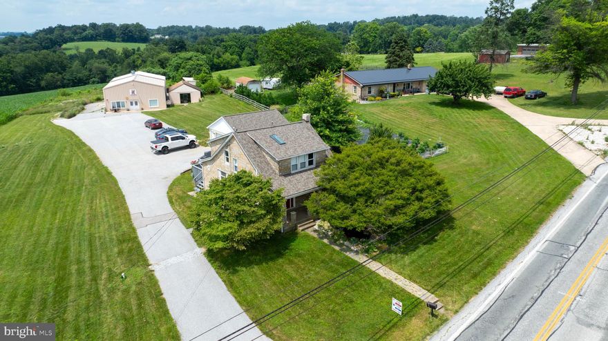 Endless Possibilities Await!
This beautifully updated 3-bedroom, 2-bath Cape Cod sits on nearly 3 acres and offers a unique blend of residential comfort and commercial opportunity. With close to $100,000 in upgrades over the past few years, this property is move-in ready and packed with potential. Whether you're looking to work on your own vehicles, start a home based business, or simply enjoy the expansive space, this property has it all.

Zoned for residential and commercial mixed use, it features parking for 15+ vehicles and was previously home to a tag and title company. Out back, you’ll find a massive 40' x 68' two story building with a showroom, office, and workshop space ideal for entrepreneurs, hobbyists, or investors.

Don’t miss this rare opportunity to own a versatile property with room to grow. The possibilities are truly endless!