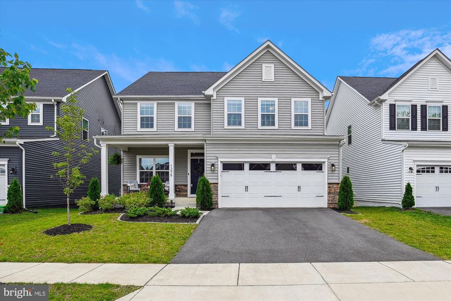 <b> OFFER DEADLINE - MONDAY, JUNE 10TH at 3:30 PM.</b> <br><br>

BETTER THAN NEW – In the highly sought after neighborhood of Two Rivers, this all ages home is less than 3 years old, in immaculate condition, and backs to mature trees with peaceful wooded views. Attractive LVP (luxury vinyl plank) flooring stretches from the foyer entry into the gourmet kitchen, which is anchored by an oversized Quartz island with pendant lights. The stunning kitchen also has abundant white cabinetry, stainless steel appliances, and subway tile backsplash. The spacious dining area features a modern, new light fixture and leads to the screened-in porch and composite deck, for easy entertaining indoors and out. With open concept living, the kitchen is open to the spacious family room with cozy gas fireplace. The owner’s suite provides a spacious retreat with eye-catching tray ceiling, an amazingly large walk-in closet, and attached bath with double Quartz vanity, water closet, and walk-in shower with two shower heads, built-in bench, and custom tile. Three additional bedrooms of generous size are also found on the upper level, along with a beautifully upgraded second full bath, and a convenient upstairs laundry room. The finished lower level has a third full bath, and an expansive rec room with recessed lighting, full sized window, and walk out slider to the private backyard. Upgraded smart light switches offer convenience and remote control when away from home. All this, and an absolutely amazing list of amenities that come with living in Two Rivers including outdoor pool, tennis court, indoor and outdoor pickleball courts, walking paths, biking trails, dog park, playground, full size indoor and outdoor basketball courts, volleyball courts, clubhouse, and more! This one is beyond perfect and move in ready!