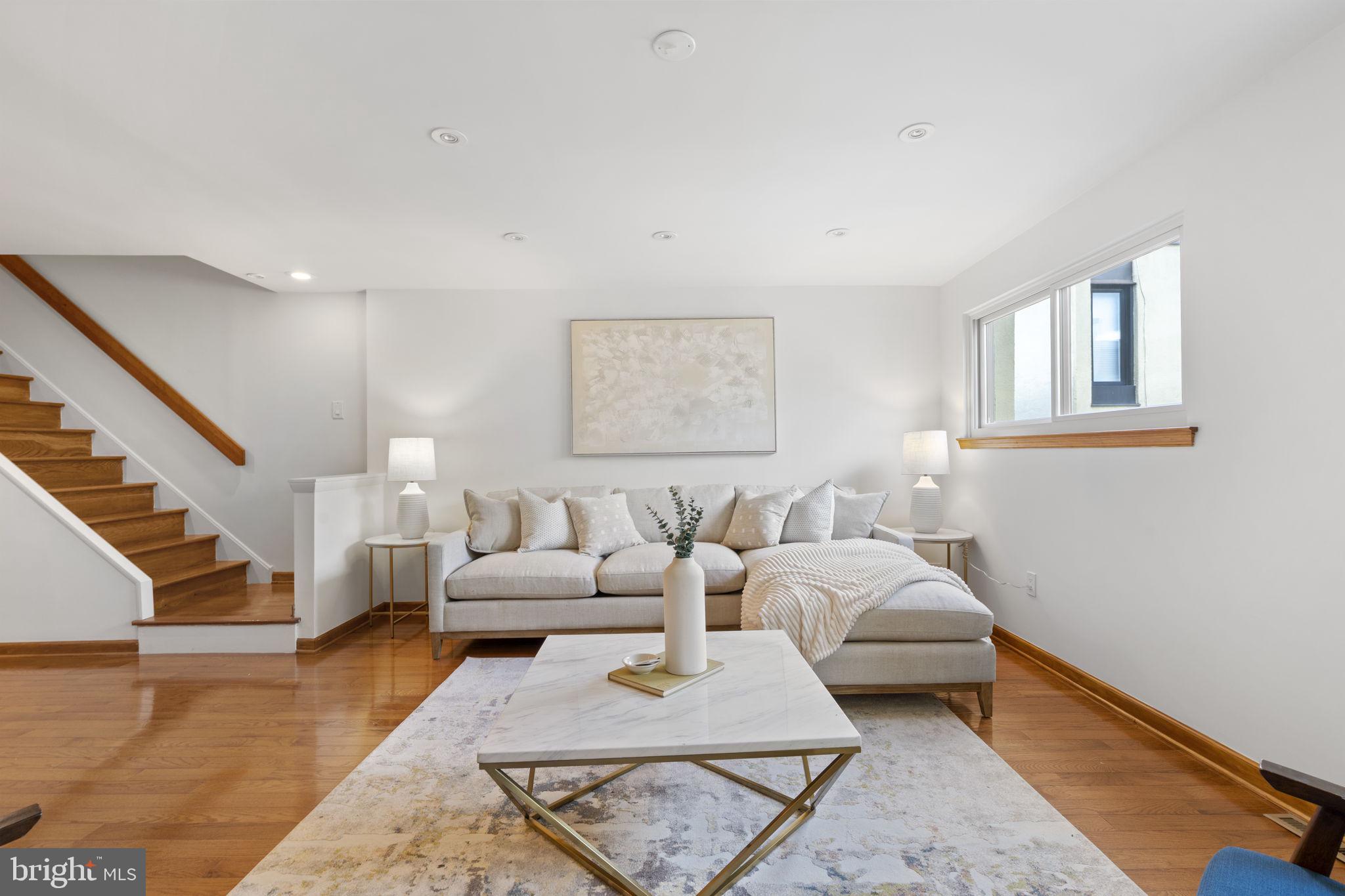A unique find for the buyer who enjoys the perks of city living, this spacious home is tucked away in a lovely courtyard. It blends comfort, versatility, and unbeatable convenience in one of Philadelphia’s most vibrant neighborhoods.
After entering the community, you will access the home to a flexible den with a sitting area, laundry and storage space, and sliding doors that open to a peaceful back patio with built-in planters.
The second level serves as the main living area, featuring a fully equipped eat-in kitchen with ample cabinetry, generous counter space, a tiled backsplash, and a tiled floor. An adjacent dining area and living room showcases recessed lighting and timeless hardwood floors, creating a warm and open flow.
Upstairs, the third level offers three nice-sized bedrooms, including two that share an entrance, along with a full tiled bathroom featuring a tub/shower combo. The top floor is dedicated to the primary suite with city views, a sitting area or spacious office, access to a lovely deck overlooking Segar Park, and an ensuite bath with a beautifully tiled shower. Ample closets and thoughtful storage are found throughout the home. From the upper levels, you can even catch a view of Billy Penn atop City Hall.
Residents of Alder Court enjoy a delightful community where shared spaces are thoughtfully cared for. Located in the heart of Washington Square West, close to grocery stores, pharmacies, top-rated restaurants, cafés and the Avenue of the Arts. Public transit, hospitals, historic landmarks, schools and event spaces are all close by, making it a truly convenient location for enjoying city life.
The sellers are offering 1 year of prepaid parking at the garage at 545 S. 11th Street, which is conveniently located nearby.
1035 Lombard offers the best of Philadelphia living with private outdoor spaces, generous square footage, and access to everything Washington Square West has to offer.