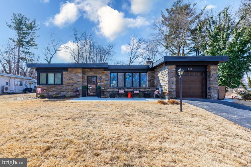 This beautiful ranch-style home, located in the highly sought-after Marple-Newtown School District, offers one-floor living at its finest. Nestled on a quiet cul-de-sac, this spacious 3-bedroom, 2.5-bath home features low taxes and an open, inviting layout with a stunning newly resurfaced in-ground pool. The living room is enhanced by a charming stone fireplace, high-hat lighting, and controls, while the dining room flows effortlessly into the kitchen and back den. The chef's kitchen boasts stainless steel appliances, elegant wood cabinetry, a pantry, granite countertops, and a ceramic tiled floor. The impressive Master Suite addition includes two large walk-in closets and a luxurious master bath with a jacuzzi tub and stall shower. Two additional generously sized bedrooms share a beautiful hall bath. Enjoy outdoor living in your private, fenced yard, complete with a putting green and a gorgeous built-in pool with pergola and bar, perfect for entertaining. With a newer roof and just a short walk to shopping, transportation, and easy access to major routes (RTs 1, 467, 95) and the airport, this home offers a perfect blend of comfort, style, and convenience.