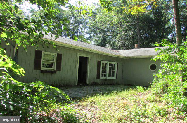 Ranch style house on a private lot just shy of 2 acres. Lots of potential. 3 bedrooms and 1 bath. Rear covered patio.