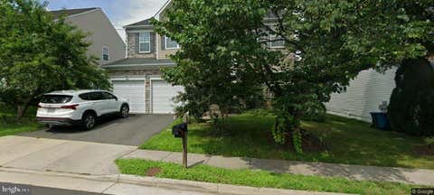 Photo of 6674 Jackson Fields Court, CENTREVILLE, VA 20121 (MLS # VAFX2337018)