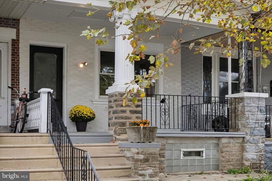 Recently taken off the market for upgrades and priced to sell, this thoughtfully updated rowhome blends historic charm with modern finishes. Set back from the street behind a garden, the classic exterior features a welcoming stone porch and double windows. Inside, original woodwork pairs seamlessly with refinished hardwood floors that run throughout.

The open-concept main level offers a bright living room with oversized windows and a decorative fireplace. A convenient powder room separates the living and dining areas. The dining space flows into a stylish kitchen with solid wood cabinetry, handcrafted details, concrete countertops, stainless steel appliances, and a large window perfect for an indoor herb garden. Step outside to a brand-new rear porch overlooking a spacious city yard.

Upstairs, the primary suite includes a bay window, an oversized closet, and a beautifully designed en-suite bath with custom vanity and a walk-in shower. Two additional bedrooms — one with dual exposures — share a modern hall bath.

Located on a quiet, tree-lined Logan block, the home is close to Broad Street, the Boulevard, and two neighborhood parks: Hunting Park Rec Center and Barrett Playground.
Easy to show, quick settlement possible