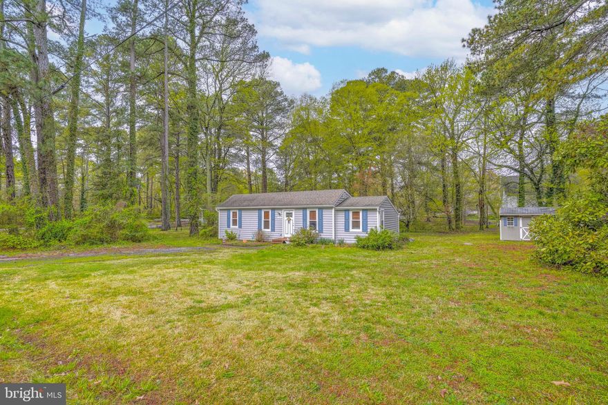 Welcome to 17585 Oriole Dr, nestled in the charming waterfront community of Cobb Island! This beautifully updated home sits on a spacious double lot and features stainless steel appliances, hardwood floors, granite countertops, and a custom tile shower. Enjoy energy-efficient windows and roofing, elegant crown molding, and a roomy utility space—all surrounded by mature pine trees. The paver walkway and patio are perfect for outdoor gatherings, and the neighborhood offers a warm, welcoming atmosphere with a strong sense of community and natural beauty. Ideal for those seeking comfort, style, and a peaceful small-town lifestyle.