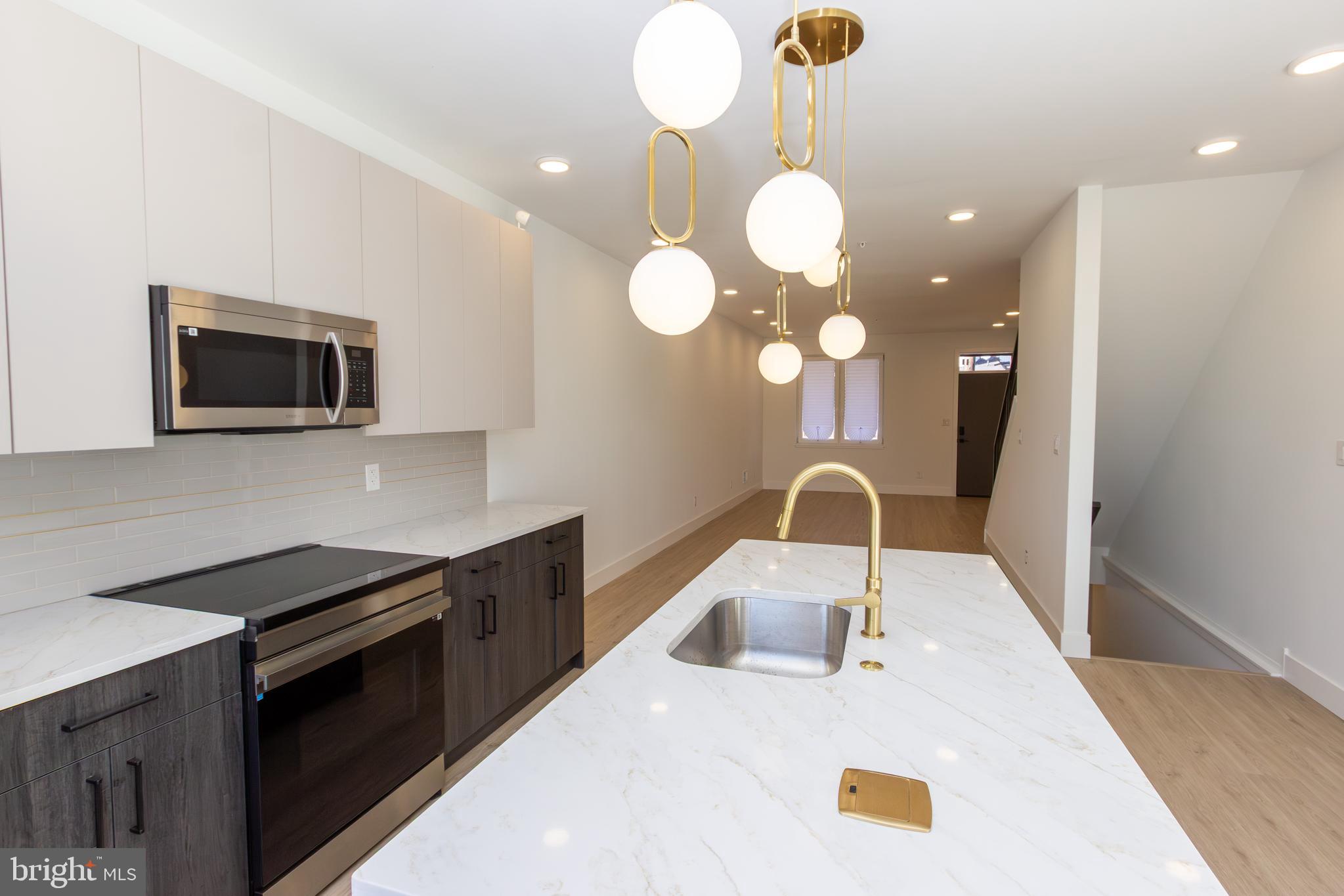***10 Year tax abatement! Welcome to your dream home—a stunning blend of modern comfort, elegant design, and versatile living spaces that cater to every lifestyle need. Nestled on a quiet street in a prime location, this residence offers both tranquility and convenient access to urban amenities.
Step inside to high ceilings, ​large European Tilt & Turn windows, and an abundance of natural light flowing throughout the space. A dual-zone HVAC system ensures year-round comfort. The modern contemporary kitchen is a chef’s dream, equipped with stainless steel appliances, an induction range, and sleek quartz countertops.
​4 spacious bedrooms, 3 full bathrooms, and a versatile finished basement—ideal as a ​guest room​ (additional 5th bedroom), playroom, or home office.
The heart of the home is the expansive master suite, complete with a generous walk-in closet and a luxurious en-suite spa-like bathroom featuring a double vanity and a separate shower—ideal for starting and ending your day in style.
But the true showstopper? The rooftop deck with unobstructed city views—​ imagine h​osting unforgettable gatherings under the stars, all while enjoying the serene ambiance of your surroundings. The large backyard invites endless possibilities, from casual gatherings to lively games of Cornhole with friends and family.
Don’t miss this rare opportunity—schedule your private tour today!
**The property boasts exceptional access to key city destinations. Just to the south lies University City, a dynamic hub of education, healthcare, and innovation. To the north, Fairmount Park, one of the largest urban green spaces in the nation, provides abundant opportunities for recreation and outdoor activities. To the east, the Girard Avenue commercial corridor offers a vibrant mix of shops, restaurants, and entertainment options, making this location highly attractive for residents and investors alike.
(Only 3% down required, Conventional Mortgage insurance WAIVED.
Rate 1% below our current rate. Today it’s 6.0%. Primary buyer
does not need to be a first timer, $6,000 lender credit for a first timer. No income restrictions)