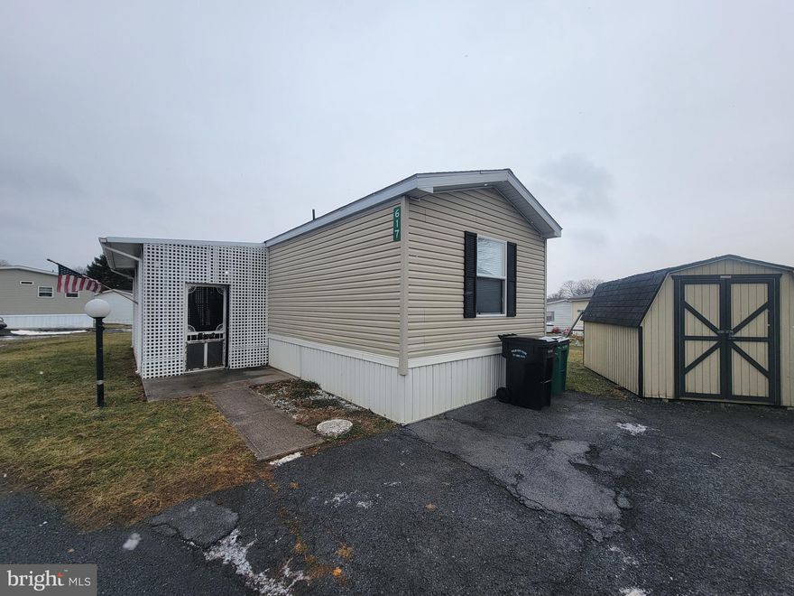 Looking for affordable living in a peaceful community? This charming 2-bedroom, 2-bathroom manufactured home in Palm City Park offers a comfortable and convenient lifestyle within the Annville-Cleona School District.  The open-concept kitchen and living room create a bright and inviting space perfect for relaxing and entertaining.  Enjoy the outdoors on the screened-in porch, ideal for morning coffee or evening gatherings.  A storage shed is also included, providing extra space for your belongings.  Park Approval is required.