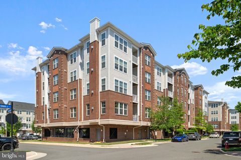 Photo of 3160 John Glenn Street #501, HERNDON, VA 20171 (MLS # VAFX2306406)