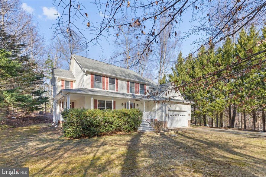 Here's your opportunity to own a water-oriented property!!!  Just off the Patuxent River located on Cat Creek that offers a peaceful, natural setting surrounded by a tranquility. While the creek is not visible from the home, the property includes direct water access with a private pier, making it ideal for kayaking, nature watching,  sipping a warm or cold beverage and enjoying the waterfront lifestyle. Set on a one-acre lot in Mechanicsville, this well-maintained home features 4 bedrooms, 2.5 baths, and a two-car front-entry garage, with exceptional curb appeal highlighted by an expansive wraparound front porch and a striking double-size stairway. The main level welcomes you with hardwood floors throughout, a bright foyer, a formal living room ideal for a den or playroom, and a dedicated home office, along with a separate formal dining room, half bath, and interior access from the garage. The kitchen anchors the rear of the home and features stainless steel appliances, tiled flooring, pantry, pot rack, modern fixtures, and abundant cabinet space, with a built-in desk overlooking the spacious family room that offers a gas fireplace and access to the backyard, while the sunroom just off the kitchen is filled with natural light and provides a comfortable space to relax while enjoying views of the surrounding landscape. Upstairs, the primary suite offers tray ceilings, blackout blinds, a walk-in closet, and an ensuite bath with a dual-sink vanity, oversized shower with two shower heads, and a private toilet closet, while three additional generously sized bedrooms with ceiling fans and closets share a full bath with two separate vanities, one bedroom featuring a Murphy bed with built-in bookshelves, and an upper-level laundry room adding convenience. The basement is drywalled and ready for finishing, offering flexible space and multiple storage areas to design to your needs, while outdoor living is a standout feature with a covered patio and gazebo-style grilling area, composite decking, and a scenic backyard with a path leading to stairs down to a private pier on Cat Creek. Additional highlights include a whole-house generator and three storage sheds, with recent updates including interior painting, new dishwasher, new microwave, a new upgraded front door with sidelights and a screen door, composite front porch and steps, composite rear deck, tankless water heater, thermal compression tank, Hunter Douglas blackout blinds in the primary bedroom, replaced garage door opener, replaced heat pumps, and whole-house AprilAire humidifiers, with an updates sheet available in the document section.