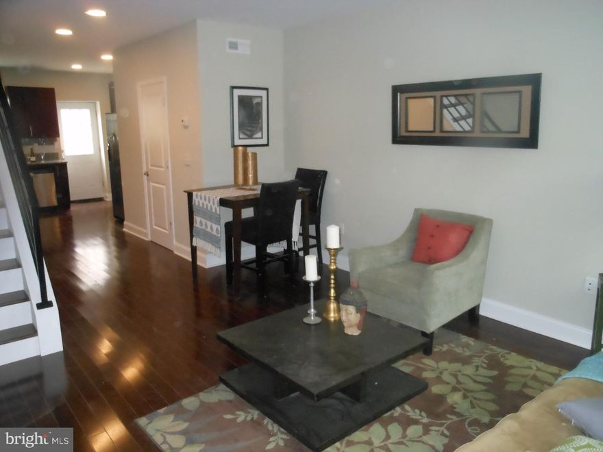 Enter in to this brand new rehab and you'll love what you see. The living room has nice cherrywood hardwood floors, high hat lighting. The stunning kitchen has gorgeous granite coutertops, solid cherrywood cabinets, stainless steel appliances. On the second floor, you will find 2 nice sized bedrooms with hardwood floors, each with closets. There is a nice comfortable bright bathroom. You will also find your laundry area on this floor. Move on up to third floor and you will love the master suite with its own bath and walk in closet. And wait until you see the view from your roof top deck. There is also a nice sized yard for outdoor entertaining. And yes there is also a finished basement.