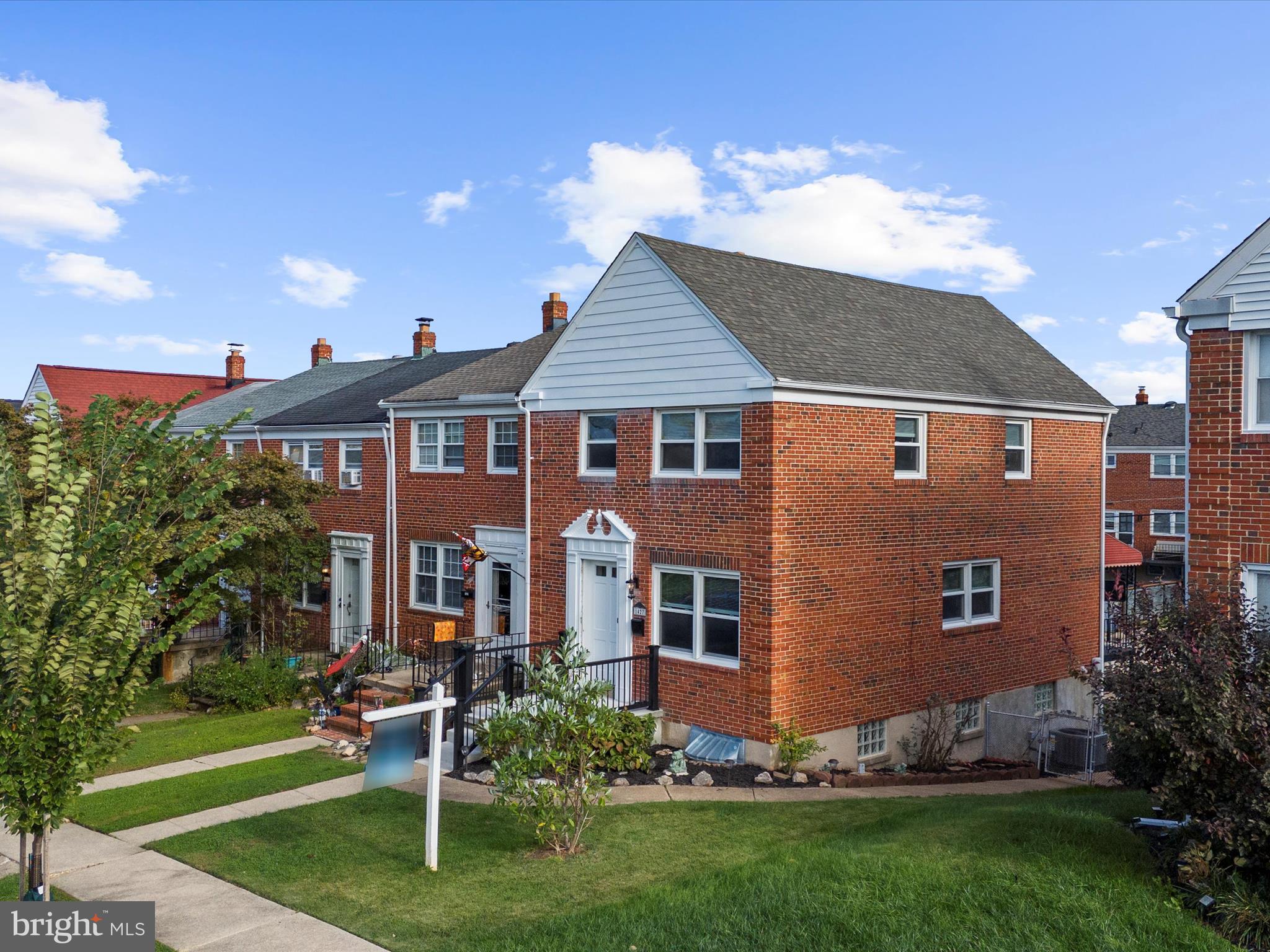 1427 Barrett Road, Gwynn Oak, MD 21207
Welcome to this beautifully updated end-unit brick townhome in Baltimore County, offering more than 1,700 square feet of interior space and over 1,500 square feet of finished living area. From the moment you arrive, the home impresses with a lovingly maintained front and side garden, a new concrete sidewalk and steps, and a welcoming front porch accented by a black rod railing.
Inside, gleaming refinished hardwood floors flow across the main level and continue upstairs, highlighted by new decorative wood railings and balusters. Fresh paint, upgraded lighting, and new grounded outlets and switches add modern convenience throughout. The spacious living and dining rooms create a warm and inviting atmosphere, while the updated kitchen features natural wood cabinetry, granite countertops, and plenty of workspace. Upstairs, three bedrooms share a recently remodeled full bath with a wood vanity.
The finished lower level extends the living space with luxury vinyl plank flooring, a second full bath, and a utility/storage area. Outdoor living is equally appealing with a large rear deck and canopy, shaded patio, parking pad, and storage shed.
Major upgrades include a newly installed high-efficiency heat pump with gas furnace, a new gas hot water heater, and a new 150-amp electrical panel with exterior shut-off to code. Additional improvements such as energy-saving blown-in insulation and a floored attic with pull-down stairs provide both efficiency and extra storage. Thoughtfully updated and move-in ready, this home combines comfort, function, and convenience.
Ideally located, the property sits just moments from the shopping and dining district along Baltimore National Pike in Catonsville, with easy access to I-695 and I-70 for commuting. Nearby Patapsco Valley State Park and Baltimore City attractions add to the appeal, offering endless opportunities for recreation and convenience.
