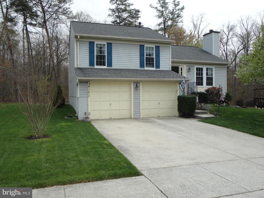 Delightful 3 Bed Room, 2 Full bath split level in popular Box Hill South. Home shows very well w/ Living Room w/fireplace, spacious family room, & fully finished basement. There is also a 2 car garage, all on a 1/5 acre lot that backs up to a wooded area.  There is a large deck for relaxing or entertaining off a fabulous, eat-in kitchen.  Newer windows and roof!  Ready for you on the first of Feb.