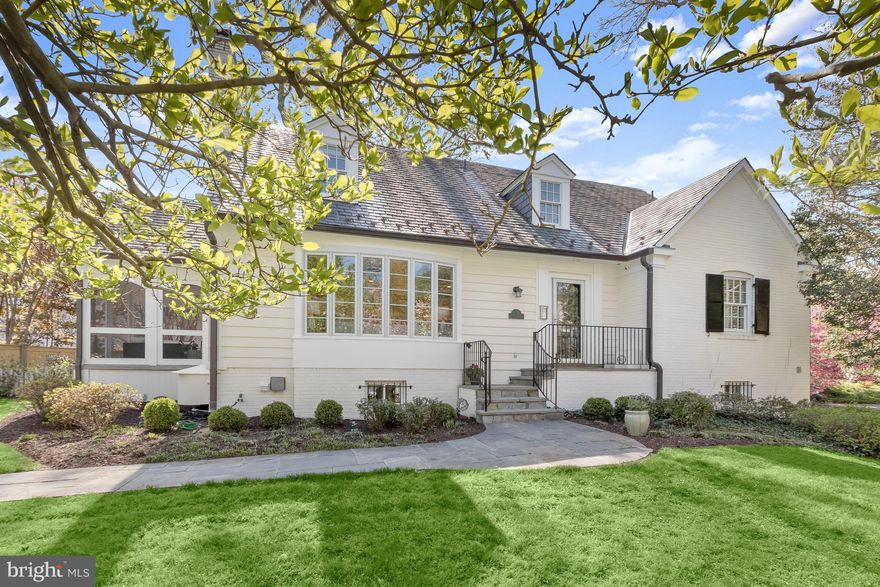 OFFERS, IF ANY, DUES TUES 4/14 AT 4:00.  Spring Valley is one of prettiest neighborhoods in all of DC, beloved for its convenient, close-in location and lovely homes set along winding, tree-lined streets.  It is easily accessible from anywhere in the city and close to shops - Crate & Barrel, CVS, Wagshals deli & market, restaurants  including the ever popular Millie's and Pizzeria Paradiso and provides easy access to the city's cultural amenities, airports and the close in Maryland and Virginia suburbs.  
The home at 5120 Upton is set back from the street by a lush front lawn with mature trees that burst into glorious bloom each spring. Its interior is  full of sunlight, which streams in through large windows in every room, and its horizontal floor plan facilitates both easy living and entertaining.  On the first floor is a spacious living room with a front bay and a fireplace; a wonderful kitchen/family room stretching across the rear of the house and opening to a deck; a dining room; and a delightful screened porch.  A convenient first floor bedroom has its own full bath.  Upstairs, the primary bedroom features exceptional closets and an en suite bath; there are  two additional bedrooms on this level plus a nicely renovated hall bath.  The finished lower level has an additional bedroom and full bath and a bright, high-ceilinged family room with large windows, a fireplace and a door to the terrace and fully fenced  garden.  The home has a 2-car garage with Tesla charger and full house generator.