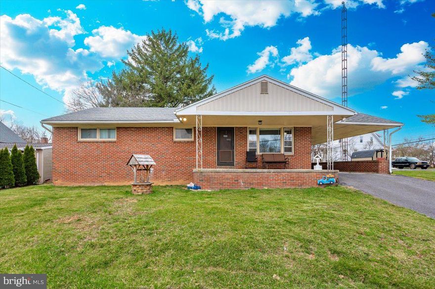 OPEN HOUSE Saturday March 29th, 12pm - 2pm - AN ABSOLUTE MUST SEE! This meticulously maintained all brick rancher is the home you've been waiting for! Conveniently located just minutes to I81/I70 and perfectly positioned on a 0.67 acre private corner lot, this gem is the perfect mix of privacy and convenience, while still being in the highly sought-after Williamsport High School district. Additional benefits to the oversized lot include a unique wooded area, large rear shed (installed 2025), ample parking with two driveways with separate designated entrances, large covered front porch, and an extended rear covered patio that's perfect for relaxing and enjoying the outdoors. Offering over 2,500 square feet, the interior of the home features an absolutely stunning kitchen remodel (remodel completed in 2024) that boasts gleaming hardwood floors, stainless steel appliances, all new pristine kitchen cabinetry, and one-of-a-kind butcher block countertops! Aside from the kitchen, the rest of the home boasts pristine hardwood floors throughout the main level, a large living room with luxury fireplace, 3 oversized main level bedrooms, and a massive walk-out basement awaiting your finishing touches. Additionally, the "bones" of the home are in excellent shape, as the roof, HVAC, and water heater were all replaced in 2017, and septic was pumped and inspected in 2023. Schedule your showing today, as this one will not last long!