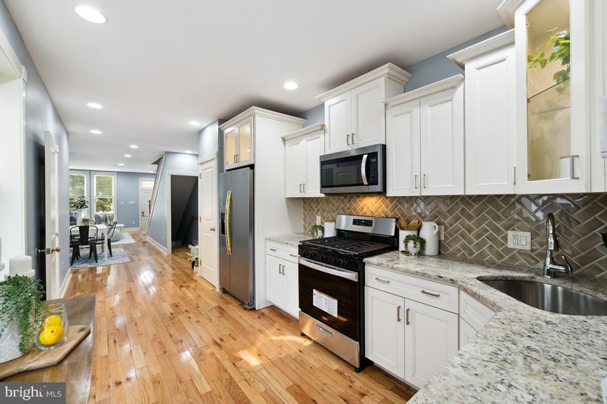 Temp off market to allow seller time for offer review. No more showings at this time. Thank you.

Unmatched full renovation top to bottom, inside & out! 3.5 baths!!! Amazing block in the heart of Oliver.
No expense spared - this one has all the custom bells and whistles. It has so many customizations that you simply won't find elsewhere. Plus, every bedroom is a suite, with its own private full bath! This drop-dead gorgeous home with 3 full bathrooms plus convenient powder room is remodeled for those with the highest standards. Custom kitchen open to the entire main level with custom lighted glass cabinets with crown moulding, granite countertops, stainless steel appliances, soft-close doors and drawers, and beautiful backsplash. Sparkling hardwood floors. Custom open railing staircase, recessed lighting, ceiling fans, fully finished basement and large rear deck, this home is an entertainer's delight. The pristine wood floors run the entire main level and 2nd floor, even to the staircase to the lower level! Each bedroom is its own suite, with gorgeous private custom full bathrooms, and spacious closets! Fully finished basement can be family room, or the perfect 3rd bedroom, with its own full bathroom also. Plus new windows, doors, new roof, deck, electric, plumbing, and entire HVAC system with central air and so much more! Beautifully refinished brick front! Privacy fenced rear yard. This one has everything you could possibly want in a home. You simply will not find a property of higher quality than this one.