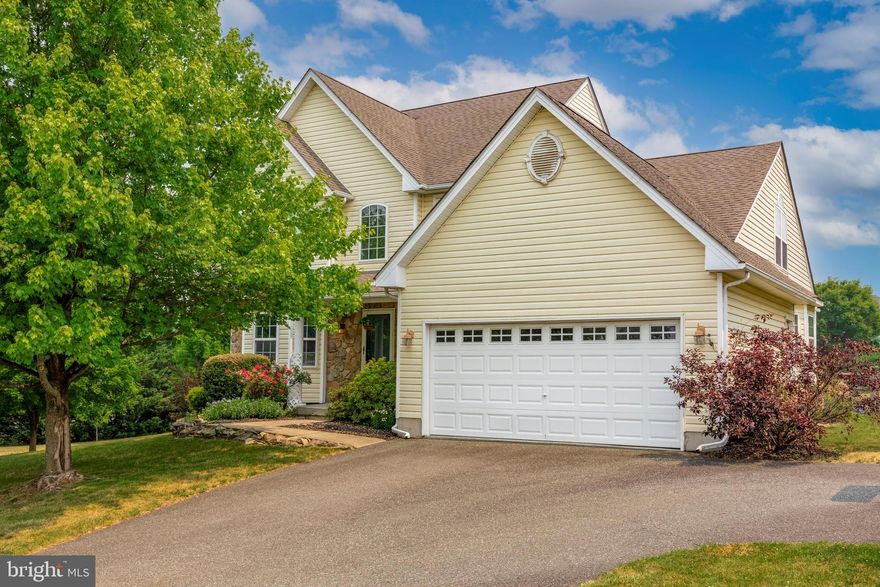 Welcome to this beautiful home located in a lovely setting of rolling hills and greenery.  The front porch beckons you in where you can enjoy the many outstanding amenities.  The 2-story foyer offers a sizable coat closet.  To your left, a formal dining room awaits you and your guests and features wood floor and crown molding.  Walk toward the rear and you will love the family room with a full wall of sunny windows overlooking the massive back yard, cathedral ceiling, and a cozy gas fireplace.  The kitchen is a thoughtful layout and includes wood cabinets, a double sink, a pantry, gas cooking, a garbage disposal and wood floors.  The laundry is also located on this level and has a tile floor.  This home has the well sought after first floor main bedroom!  This room has a walk in closet with organizers and a main bath with soaking tub with jets, a double vanity and shower stall.  Upstairs you will find 3 more bedrooms plus a room that can be used as an office.  The fourth bedroom is huge and could lend itself as a game room, exercise space, or anything needed.  A hall bath with double sinks services the upstairs bedrooms.  The basement could be finished as it has an exit to the back yard, and it houses the newer (4 year old) HVAC system and newer hot water heater.  Out back is a summertime dream with a deck that surrounds the pool, a paver patio, and lots of yard space for just about any activity.  Don't forget the 2-car garage and double driveway.   The whole house has a holiday lighting package, all controlled by a single switch.  This is truly a home to enjoy!