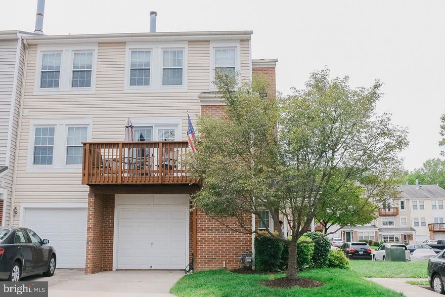 Fantastic end unit townhouse-style condo.  One car garage and driveway with additional guest  spaces.  Fully upgraded kitchen with all new stainless steel appliances.  Enjoy a beautiful view of the neighborhood and well maintained common area.  Area includes a playground and public pool.
