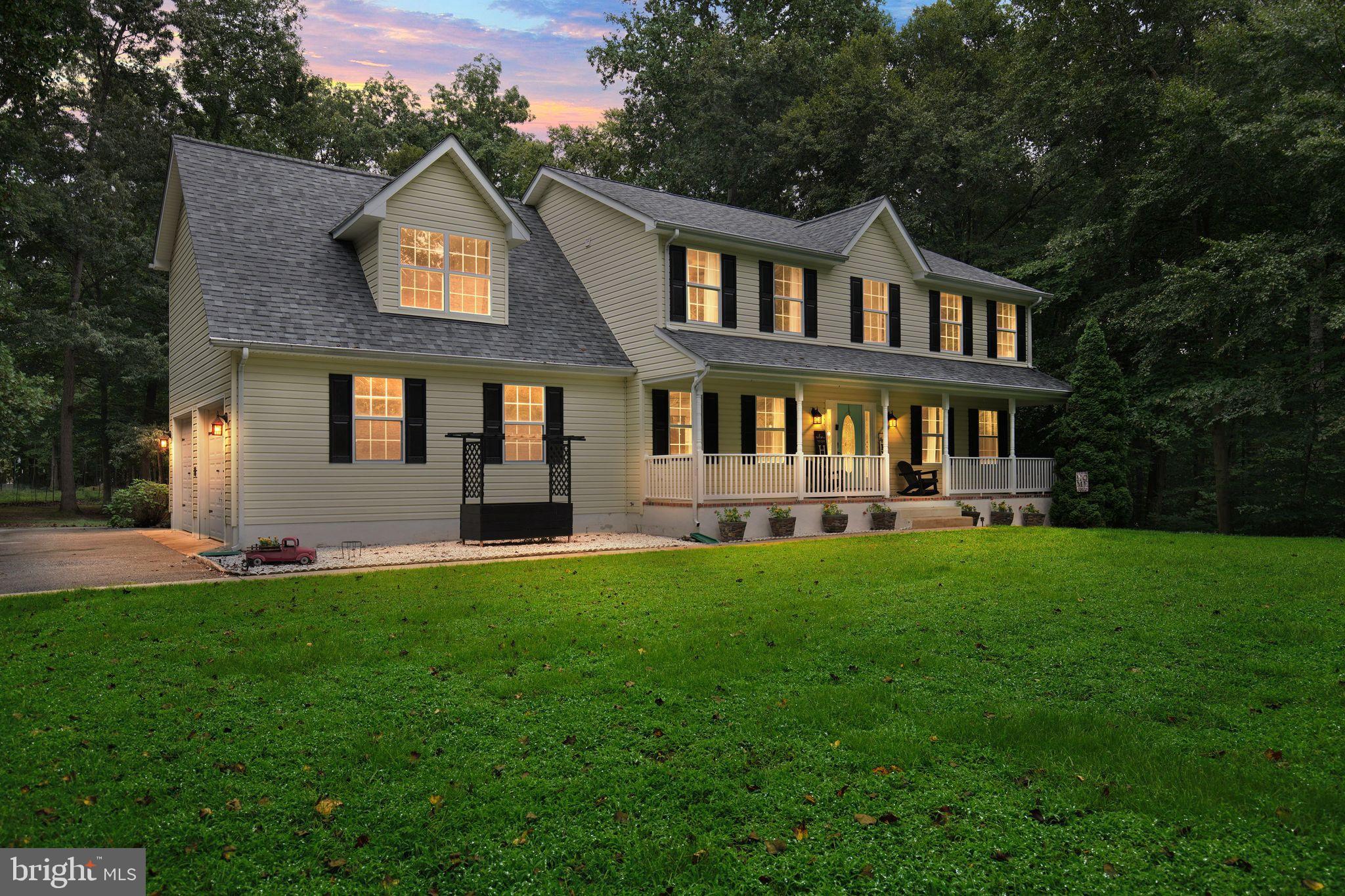 Rare Find! This beautifully updated six bedroom, four and a half full bath home sits on just over 5 acres! updates to include luxury vinyl plank flooring and carpet and paint throughout -- its move in ready and has space for everyone! Each bedroom on the upper level has an attached bathroom (Jack & Jill style). Kitchen features quartz countertops, tile backsplash, stainless appliances, and a gorgeous island for extra food prep/seating, walkout basement is all set for guests; with a large bedroom, living area, bathroom, kitchenette potential, and its own laundry! Situated on a quiet cul-de-sac, and surrounded by woods, the yard is ready for entertaining, with a beautiful deck, and large fenced in area great for pets. Additional updates include new roof (2021), New deck (2021) Updated kitchen (2018) and baths- this one is a must see!