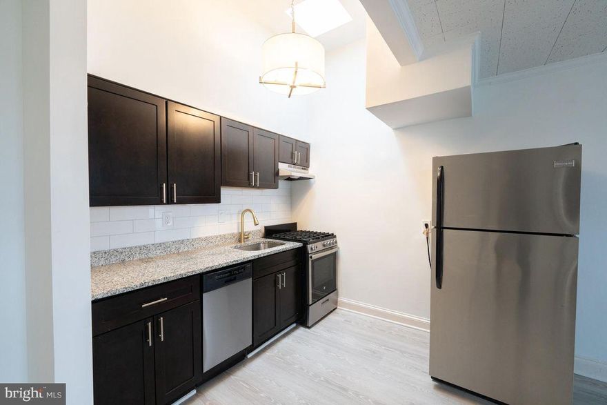 Discover your ideal apartment in Flats of Saint Paul, where modern living meets historic charm in the heart of Mount Vernon. Nestled in this picturesque neighborhood, our stunning apartments offer a refined living experience like no other.

These updated apartments step into spacious open floor plans with soaring ceilings, creating an airy, welcoming ambiance that's flooded with natural light. Your gourmet kitchen, adorned with sleek appliances and black matte hardware, will inspire your inner chef. The custom walk-in closets, engineered hardwood flooring, quartz countertops, greenery accent wall, and posh lighting add more than a touch of opulence to your everyday routine.

Mount Vernon, where suburban serenity meets urban vitality. Ideal for families and young professionals, this lifestyle destination offers a perfect fusion of tranquility and excitement. The community is steps away from Baltimore Penn Station as well as vibrant dining, renowned cultural attractions, lush green spaces, and the prestigious Johns Hopkins campus. Discover Mount Vernon: Your ideal city retreat.

Your oasis awaits and we are ready to help you find your dream apartment at Flats of Saint Paul!

Please note that the photos are of a model apartment home at Flats of Saint Paul.