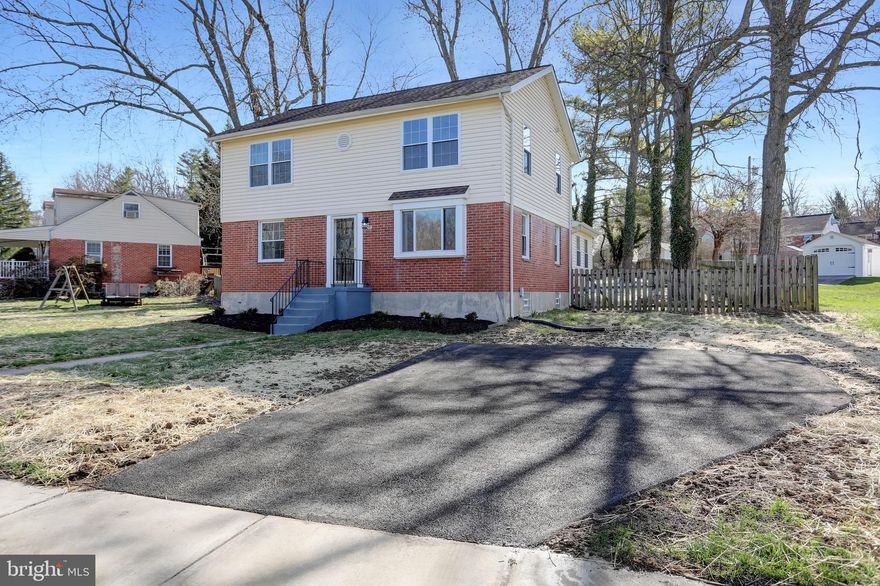 Welcome to this recently updated home in the wonderful subdivision of Sudbrook Park in Pikesville.  This amazing 4 bed 2 bath colonial home sits on a peaceful level lot directly across the street from the community park with playground and walking trails.  On the first floor you will find a living room, dining room, bedroom, full hall bath, and a kitchen that is open to a large family room with solid hardwood floors and ample natural light.  The kitchen offers beautiful quartz counter tops, SS appliances, recessed lights and breakfast bar seating that overlooks the amazing family room.  Upstairs you will find the primary bedroom that offers 4 closets plus window seat storage, accent lighting, recessed lighting, ceiling fan and an attached full bathroom.  Also upstairs you will find 2 additional large bedrooms and washer and dryer hookups.  The unfinished basement houses the brand new HVAC unit and has plenty of ceiling height to add additional living space if desired.  Outside you will find a large covered deck that overlooks the completely fenced back yard. This home has been updated from top to bottom and is move-in ready.  Schedule a showing to see this lovely home ASAP before it’s too late.