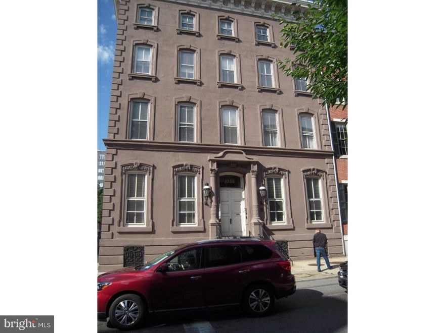 Rarely available nearly 1000 sf, 1 bedroom, first floor urban oasis in a historically certified brownstone (The Roberts-Quay Condominium) if you enjoy the urbane life this location, its blend of contemporary design with craftmanship, and top -of-line appliances. The 160 sf open living room is separated from the other rooms and positioned in the southwest corner of the mansion with 12'high ceilings, exposed ceiling beams, and tall windows that create an exceptional sun filled oasis. To top it off there is decorative fireplace and mantel. The room is cable ready and a flat screen mounting bar is already installed. Beautiful hardwood flooring runs through the first floor. An eat-in-kitchen fills the middle part of the unit together with a totally renovated kitchen that features marble counter top and backsplash and recessed lighting. The approximately 200 sf loft bedroom is situated over the kitchen area with one pen railed side. New patterned wall to wall carpet is being installed to make for an elegant up to date retreat. The attached bathroom was renovated recently with a double vanity, beautiful tile, glass shower enclosure, and includes laundry. An attached walk-in closet completes the loft area. bike storage is available. There is street parking and parking lots available nearby. Roberts-Quay is a well maintained condominium community . What's best is how we manage. We are responsible and keep rentals in good condition. Act quickly for this truly unique unit. Water is included with the rent. Once you contact PECO you are ready to start living the life on beautiful Spruce Street, in the heart of Center City. This move in ready unit is convenient to Jefferson medical and Pennsylvania Hospitals, a short walk to Washington Square or Rittenhouse Square, Center City shopping, restaurants, and entertainment are all close by. Cafes are out the door at two opposite corners!