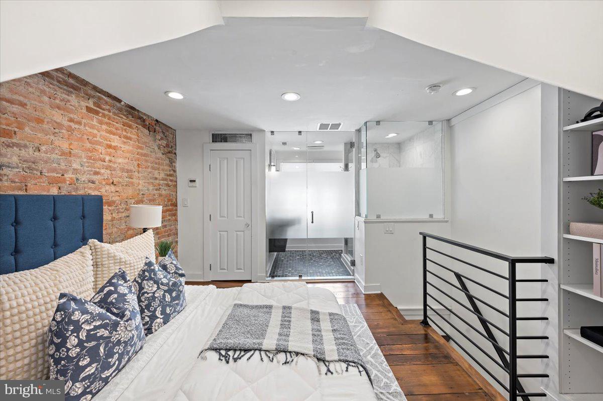 Welcome to Philadelphia’s most charming block! Nestled on a serene, tree-lined cobblestone street in the heart of Washington Square West, this beautifully renovated 3-story townhome offers the perfect blend of historic charm and modern luxury. Featuring 3 true bedrooms, 2 full bathrooms, 1 main level powder room, and two private outdoor spaces, this home invites you into a lifestyle of effortless city living with timeless design.
The first floor welcomes you into a spacious, light-filled great room with hardwood floors, a cozy dining nook, and an original (non-functioning) fireplace that adds just the right touch of character. The open chef’s kitchen stuns with granite countertops, soft-close Wolf cabinetry, and top-of-the-line stainless steel appliances, including a Viking stove, Bosch dishwasher, and Blomberg refrigerator — all perfectly arranged around a convenient breakfast bar. French doors open to your private garden patio, ideal for morning coffee or evening wine under the city lights.
Upstairs on the second floor, you'll find two spacious bedrooms, each with large closets and sliding barn doors. The larger bedroom includes another non-functioning fireplace and smaller bedroom opens to a private balcony, your own peaceful retreat. The full bathroom is elegantly appointed with designer tile flooring and a striking pedestal sink.
The third floor is your primary sanctuary, boasting a full-floor owner’s suite with a walk-in closet and a spa-inspired en-suite bathroom. Think radiant marble flooring, a glass-enclosed walk-in shower, and a frosted-glass exterior wall that invites natural light while maintaining privacy.
Additional highlights include:
✔️ High-efficiency on-demand hot water & heating system
✔️ Multi-room ductless mini-split A/C + secondary heating, discreetly tucked into each floor’s ceiling
✔️ Restored original wide-plank pine floors on the second and third levels
✔️ Washer & dryer in the unfinished basement, which also provides generous storage space
🌟 LOCATION, LOCATION, LOCATION 🌟
Live steps from everything — Washington Square Park, Jefferson Hospital, Midtown Village, the Kimmel Center, Whole Foods, and an endless list of Philly’s finest dining, shops, cafés, and culture. Whether you’re commuting, entertaining, or simply enjoying the neighborhood vibe, this address delivers convenience, charm, and value at every turn. Your Washington Square West dream awaits at 238 S. Hutchinson Street — a rare chance to own a piece of Philadelphia history, perfectly reimagined for modern living.