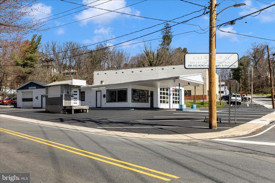 This commercial property presents a compelling investment opportunity, strategically situated on a prominent corner lot spanning 0.46 acres. The advantageous location enhances visibility and accessibility, making it ideal for various commercial ventures. Constructed in 1961 with durable block materials, the property features a robust concrete flooring system, ensuring low maintenance costs and longevity. The lighted, paved parking lot provides ample space for customers and employees, enhancing operational efficiency and customer experience. Investors will appreciate the potential for significant returns immediately, given the property's established loyal, longtime business (included) that generates on average $144,500 annually EBITDA. This commercially zoned corner lot positioning not only maximizes exposure but also allows for potential signage opportunities, further driving foot traffic and brand recognition. The absence of an association fee and the lack of restrictive amenities provide flexibility in property management and operational decisions, allowing investors to tailor the space to their specific business needs. With the historic Sykesville real estate market continually evolving and growing, the combination of strategic location, solid construction, and flexible usage options positions this property as a sound investment for those looking to capitalize on the growing area. Take a look at our 3D tour.