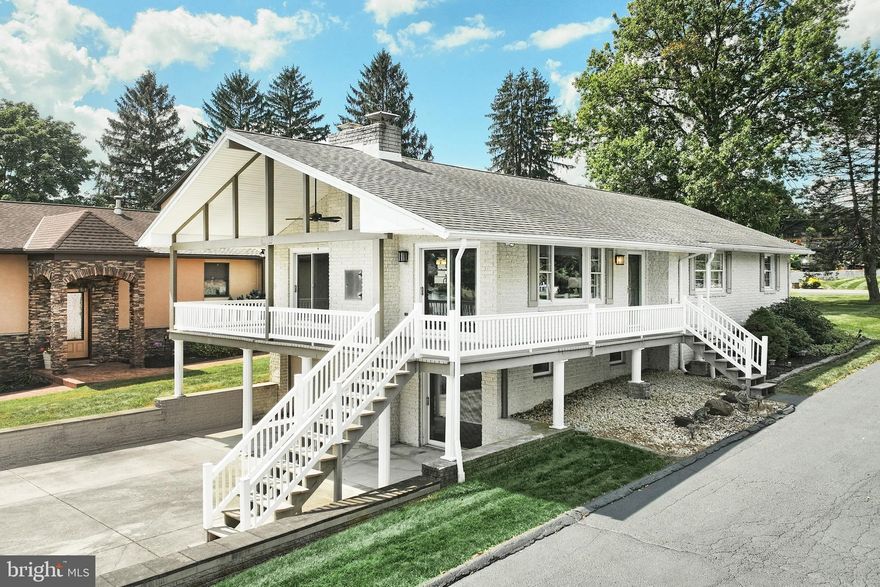 Lake Meade Lakefront Rancher with Panoramic Views & Dock. Welcome to this extraordinary split-rock rancher offering 180-degree views of Lake Meade and a lifestyle designed for comfort, entertaining, and unforgettable days on the water. The open floor plan with cathedral ceilings creates an immediate sense of space and light. The great room, anchored by a fireplace, opens seamlessly to the outdoors. Enjoy easy lakefront living with three sliding glass doors that provide direct access to the expansive covered wraparound deck—from the dining room, living room, and great room. The main level also features: 
A primary suite with its own bath, complete with a walk-in shower and a large linen closet. Two additional spacious bedrooms. A kitchen with all appliances included, a breakfast bar, and plenty of storage. The lower walkout level offers incredible flexibility, perfect for an in-law suite, guest quarters, or a family retreat. Highlights include: A welcoming family room with a wood-burning fireplace and luxury vinyl plank flooring. A bedroom and a beautiful bath. An expansive entertaining area with cabinetry, wet bar, refrigerator, sink, and generous counter space—ideal for preparing meals after a fun day on the lake.
Direct access from the garage, which can double as an additional entertaining space for lake gatherings.
Laundry hook-ups are available on both levels for your convenience. Outdoor living completes this exceptional property: Two composite docks, one with a boat lift, and a boathouse—all low-maintenance and ready for enjoyment. A hardscape patio with a fire pit for lakeside evenings. Covered and uncovered deck spaces, all oriented for panoramic water views. Unusually spacious parcel with extensive road frontage, offering versatility for future uses. Every detail of this home has been thoughtfully designed for easy lakefront living. Imagine swimming, boating, kayaking, or fishing during the day, then hosting friends and family in spaces created for connection—indoors and out. Whether entertaining a crowd, welcoming guests for the weekend, or simply relaxing by the fire pit as the sun sets, this home offers the very best of the Lake Meade lifestyle.  Schedule your private tour today. Enjoy the Lifestyle of Lake living at Lake Meade, a private community with a gate. Our Lake is artificial, consisting of approximately 300 acres & 5.84 miles of shoreline. Water sports are a blast on the lake, including water skiing, tubing, wakeboarding, paddleboarding, kayaking & swimming. Powerboats, kayaks, canoes, sailboats, and pontoon boats share the Lake. (Some restrictions do apply) Anglers will love fishing here. Bass, Walleye, Perch, Crappie, Blue Gills, and Sunfish are just some of the fish you will have fun reeling in. Activities for all ages include a swimming pool with lifeguards & a giant slide with two curves, as well as a zero-entry pool with a mushroom fountain and depths ranging from 0 to 3 feet. The Diving Area is 12 feet deep with two diving boards. The main rectangular pool measures 50 x 82 feet with depths ranging from 4 to 5 feet. There is also a bath house with showers, lockers & a snack shack. Lake Meade has 10 waterfront accesses with boat docks, playground equipment, and picnic areas. There are two basketball courts, a tennis court, and you can also play pickleball. The sports complex offers a baseball field, sand volleyball courts, soccer fields, playground equipment for small children & a picnic pavilion. The marina provides two boat launches & limited boat services. Our 4th of July celebration is a spectacular culminating event featuring a water firework display. Northeast Adams Fire and EMS serves East Berlin and our community with one station inside the Lake.  A Realtor must be with you to visit our community! Call us for a tour!