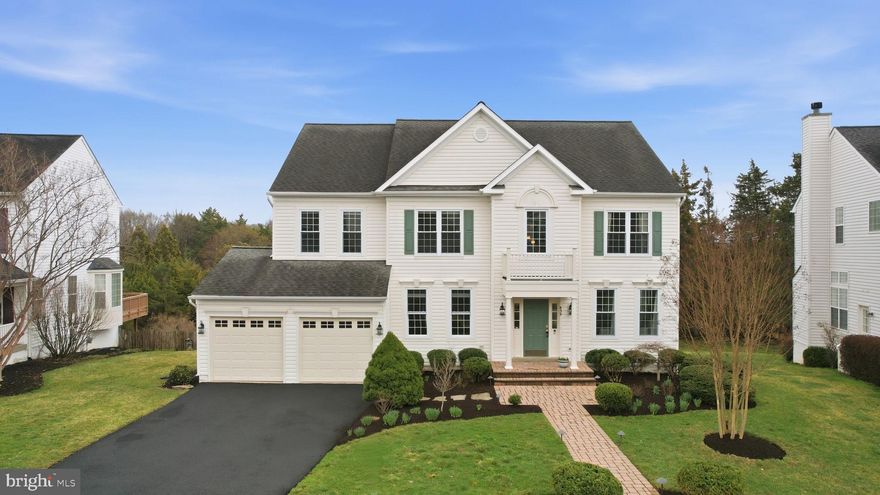 Assumable VA Loan for a Veteran at 2.25% — Ask Agent for Details!

Beautiful single-family home backing to wooded HOA common area in the sought-after Tavistock Farms community, offering breathtaking, unobstructed views and exceptional privacy. With no homes directly behind, the setting feels like a private nature preserve, with stunning seasonal scenery enjoyed from the deck, main living areas, home office, and primary suite.

A grand two-story foyer welcomes you, flanked by a formal dining room and an elegant sitting room with sightlines to the double-sided gas fireplace shared with the great room. The light-filled white kitchen features crisp cabinetry, gas cooking, a large center island, wall oven, built-in microwave, walk-in pantry, and bar area, flowing seamlessly into the great room—ideal for both everyday living and elevated entertaining.

Step outside from the sunroom to the expansive deck overlooking serene, wooded common grounds—an ideal setting for morning coffee, al fresco dining, quiet evenings, or hosting guests.

Just off the great room is a private office with custom built-ins and tranquil backyard views, along with a spacious half bath. Upstairs offers four generously sized bedrooms, including a luxurious primary suite with a walk-in closet and a beautifully remodeled en-suite bath featuring a double vanity, standing shower, and private water closet. Secondary bedrooms share an updated full bath.

The fully finished walk-out lower level adds exceptional flexibility with a fifth bedroom, large recreation room with wet bar, separate media room, upgraded full bath, bonus room, and ample storage, with direct access to the private backyard.

Conveniently located near Route 7, Route 15, and the Dulles Greenway, with easy access to Washington, D.C., Dulles Airport, historic downtown Leesburg, parks, trails, and top-rated schools.

Major updates include a kitchen remodel and new appliances (2023), new deck (2022), new windows throughout (2022), HVAC systems within the last 8 years, new driveway (2024), basement updates (2021), upstairs hall bath remodel (2021), and refinished wood floors (2019), plus more.

This is more than a house—it’s truly a place to call home.