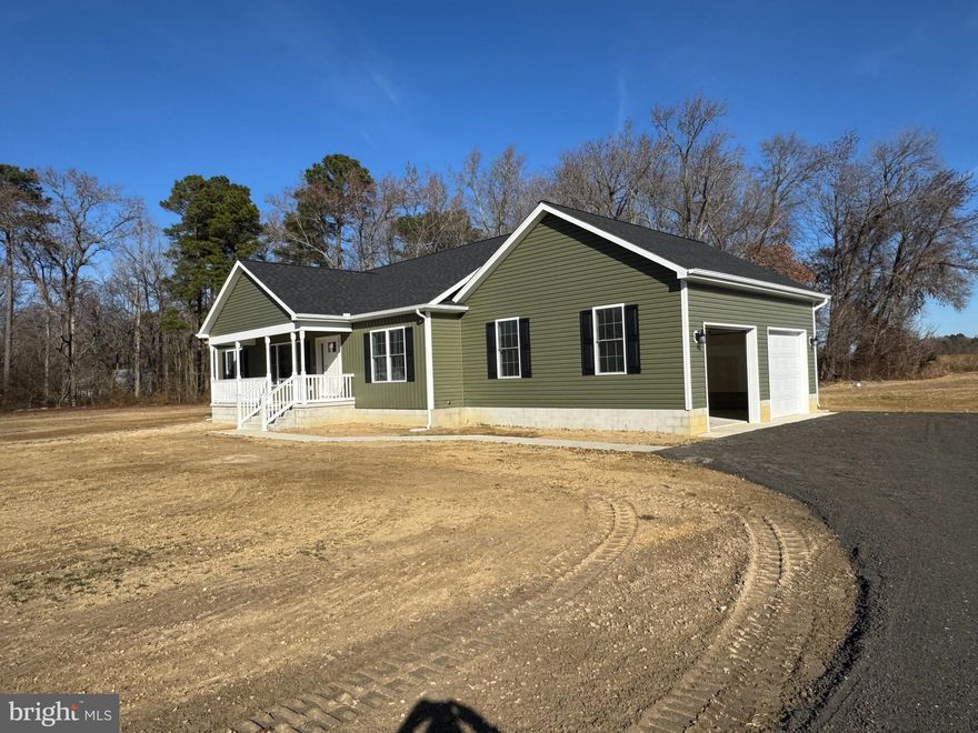 Quick Delivery – To Be Built Rancher!
This beautifully designed rancher offers 3 bedrooms and 2 full baths with an open-concept floor plan and cathedral ceilings in the main living area. The builder includes a generous package of upgrades at no additional cost. Enjoy an oversized attached two-car garage and a rear deck perfect for outdoor living. Situated on a cleared 1-acre lot in a private rural setting, this home offers the best of both worlds—peaceful surroundings with a convenient location for Delaware commuters. Close to beaches, shopping, and a nearby public boat ramp. Picture of Model will be identical unless the buyer catches it in time for changes.