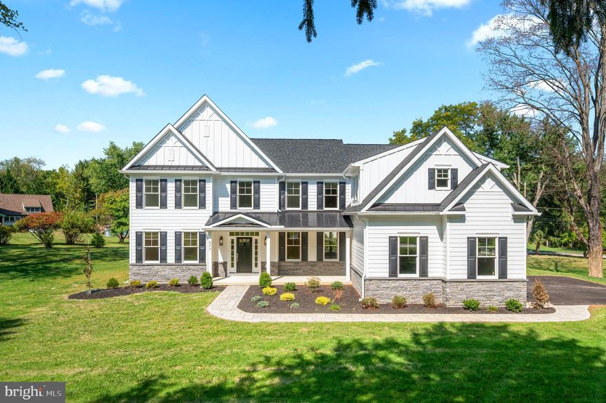 Welcome to 477 Black Swan – a breathtaking new construction nestled on a serene cul-de-sac in Berwyn. Situated on over an acre of land within the highly acclaimed Tredyffrin-Easttown School District, this remarkable 5-bedroom, 6-bath home is the epitome of luxury living.
The home boasts exquisite site-finished wide white oak hardwood flooring throughout the main floor, second-story hallway, and primary suite, along with 9-foot ceilings, custom trim, and intricate millwork. The first floor features a bright living room, an elegant dining room, a stylish home office with glass doors, and a spacious family room with a gas fireplace and coffered ceilings. The gourmet kitchen is designed for those who love to entertain, featuring beautiful cabinetry, island seating, stainless steel and paneled appliances, quartz countertops, a walk-in pantry, and a wet bar. The adjoining eat-in area opens up to the large covered patio through expansive sliding doors, perfect for indoor-outdoor living.  The first floor also includes a full bathroom, as well as a spacious mudroom with built-in cubbies, a bench, and an extra-large storage closet.
Upstairs, the luxurious primary suite is a true retreat, complete with a stunning en-suite bathroom featuring radiant heated floors, a large soaking tub, dual vanities, a generously sized shower with tile and frameless glass doors, and a private water closet. This level also includes four additional well-appointed bedrooms, each with large closets featuring built-ins. Two of the bedrooms have en-suite bathrooms, while the other two share a Jack and Jill bathroom. A coveted second-floor laundry room with ample cabinetry and a utility sink completes the floor.  The fully finished lower level offers vinyl plank flooring, a full bath with a tile shower, and additional space ideal for entertaining, a home office, playroom, or gym.  The outdoor space is equally impressive, with an expansive yard and a covered back patio featuring a cozy fireplace—ideal for relaxing mornings or evening gatherings. The property has been prepared for a pool with completed stormwater management. The home also includes a three-car garage, plenty of driveway parking, a stone walkway, and mature trees that enhance the curb appeal.  Located in a top-rated school district, with easy access to major roadways and close proximity to Waynesborough and Aronimink Golf Courses, as well as a wide variety of restaurants and shops, this property offers the best in luxury, convenience, and location.
Don’t miss the chance to make this stunning property your forever home. Contact us today for a private tour!