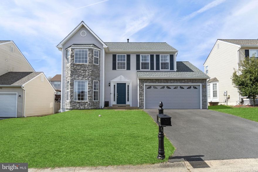 Immaculate 4-bedroom, 4-bath home in coveted Park Ridge community of Stafford. The home is situated on a premium lot on a quiet street near neighborhood amenities. Mature trees and landscaping add to the curb appeal of this picturesque home. With almost 2700 sqft spread across three levels, this property has been thoughtfully improved with composite decking, wet bar in basement, and quality finishes throughout. The main floor has plenty of natural lighting and is spacious with naturally finished hardwoods as well as natural carpeting. The large family room has a gas fireplace and is a perfect way to unwind after a busy day. The open gourmet kitchen features granite countertops, custom cabinets that go all the way to the ceiling, stainless steel appliances and a gorgeous island. The breakfast room off of the kitchen is open and bright. The upper-level hosts three spacious secondary bedrooms with oversized closets and shared hall bath. Rest well in the attractive primary bedroom. The spacious room has his and hers closets and a private ensuite bath, his & her sinks, and a soaking tub nestled under large bay windows and situated perfectly for a relaxing end to your day. The finished lower level hosts a large rec room which could easily be a theater room with a half bathroom! A wet bar finishes off this space nicely.  This area is great for a man cave, an in-law or teenager suite. The laundry room is conveniently located in basement and has an abundance of storage space.  The basement is a walk up to an expanded flat fully fenced in backyard. Mature hardscape and added privacy fencing create an oasis perfect for entertaining.  2 Car Garage with plenty of room for storage and vehicles finishes this home nicely. Updates include fresh paint, Driveway replaced in 2020, Mailbox replaced in 2020, Bathroom blinds recently replaced, carpet on stairs and upstairs recently replaced, Front door trim recently painted,  lighting updated, Roof replaced in 2017! This home is located near the community's pool.  Conveniently located near shopping, commuter lot, restaurants, I-95 and Route 1,   Quantico and so much more! Move in Ready! Don't miss out on this great home!