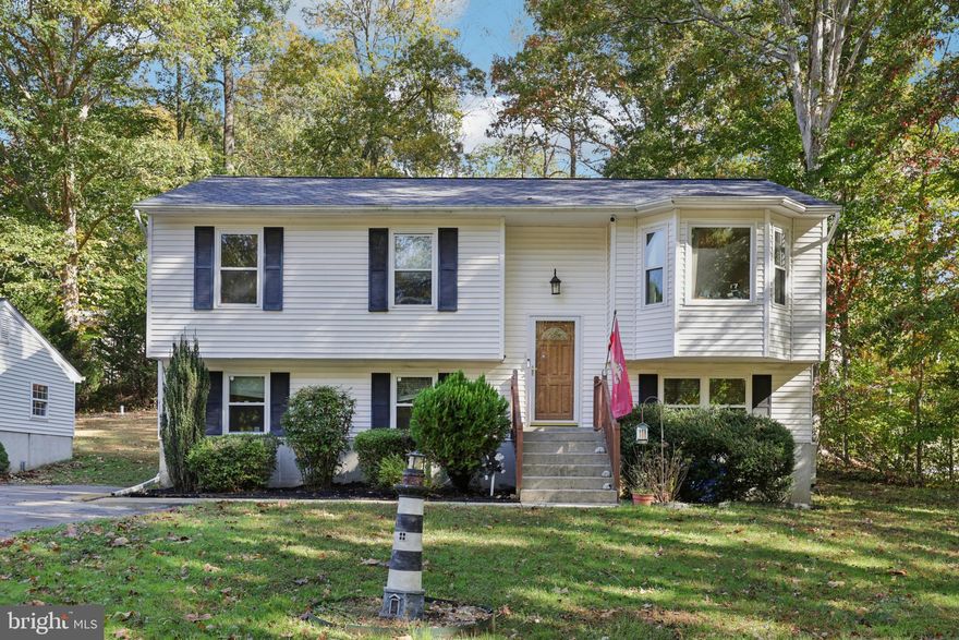 Spacious 4-bedroom, 2.5-bath home nestled on a private 1-acre lot with NO HOA in the heart of Huntingtown. Enjoy the peace and seclusion of the tree-lined property while being conveniently close to local amenities. This  home features a 2-car detached garage and a brand-new large shed—perfect for storage or hobbies. The roof is just 1 year old, offering added peace of mind. A great opportunity to own a beautiful property with room to grow, relax, and make your own.