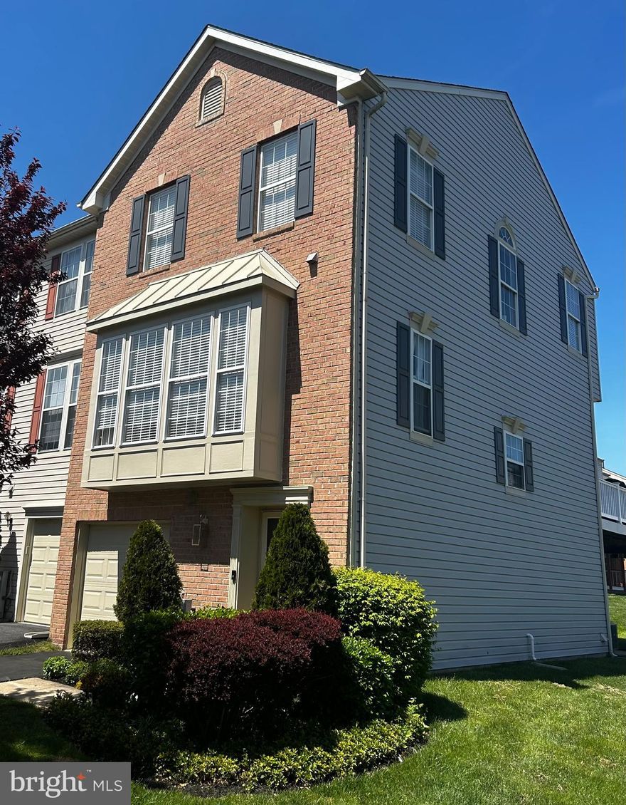 Rarely available End of Group Garage Townhome in sought after Perry Hall Farms!
This bright and airy 2200sf, brick front, 3 bedroom, 2 full bath, 2 half bath townhome/condo has the feel of a single family home but without the yard work. 
The entry level includes a foyer with powder room, hardwood on the stairs, a french-door to the spacious family room with gas fireplace, laundry room, additional custom storage closet, access to brick paver patio and perennial shade garden.
The main level living room, dining room, powder room, kitchen, breakfast area & cozy sunroom have beautiful hardwood floors.  Updated Kitchen with center island, granite countertops, stainless steel appliances, recessed lighting and ample storage. Comfortable sunroom/sitting room with access to large refurbished deck (new floor boards & white vinyl railings).
Bedroom level with neutral new carpet, updated neutral ceramic tile bathroom floors, freshly painted bathrooms, spacious primary suite with large walk-in closet & bathroom with soaking tub, separate shower and double vanity.
Recent updates include newer carpet in the family room, brand new carpet on upper stairs & entire bedroom level.  Freshly painted foyer, stairwell, bathrooms & kitchen. New deck floor boards & white vinyl railings (2022).  HVAC replaced in 2019 & water heater replaced in 2015.
This BEAUTIFUL home displays pride of ownership by its original owners.
BACK ON THE MARKET-  no fault of seller.
Lawn maintenance included in low condo fees (to be verified by buyer).
Listing Agent is related to sellers.