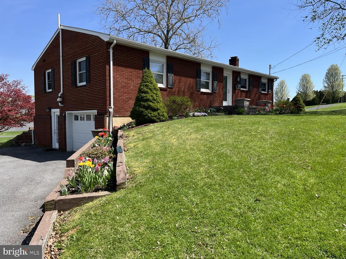 Nestled in the heart of Bellefonte, this enchanting property unveils its timeless charm. Step inside to discover a meticulously designed haven boasting 3 bedrooms and 2 full baths. The partially finished basement offers endless possibilities with a laundry room and recreational space, perfect for creating cherished memories. As you traverse the beautiful hardwood floors, your gaze will be drawn to the picturesque backdrop of a neighboring church and football field. With a convenient 2 car tandem integral garage, parking will never be an issue. This captivating residence is ready to embrace your dreams and aspirations. Seller is offering a $10,000 credit toward a new roof.