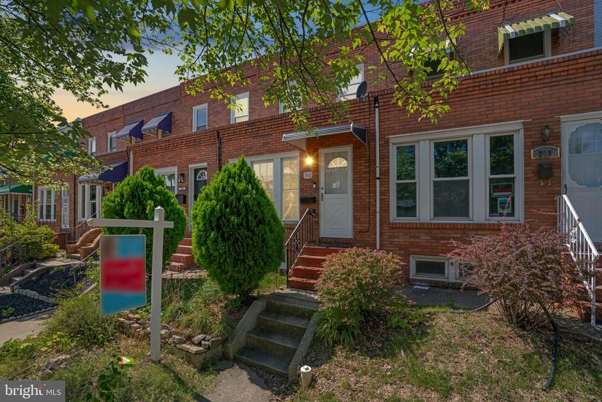 Welcom to 310 Drew Street! This beautifully maintained 2/3 bedroom, 1.5 bath townhouse blends timeless character with modern updates. Step inside to find a bright and spacious living room with high ceilings and gorgeous inlaid hardwood floors that flow throughout the main and upper levels. A set of charming original doors leads to the large formal dining room, perfect for entertaining. The crisp white galley kitchen features a gas stove and opens to a delightful screened-in sitting area between the home and the private garage. Upstairs, you'll find two generously sized bedrooms and an updated full bath. The partially finished basement offers a cozy family room or potential third bedroom, plus a laundry area with washer and dryer and ample storage space. Additional highlights include a one-car garage, updated vinyl double-pane windows, PVC main sewer line, updated electric panel and service cable (2019), roof on both the house and garage (2017), and water heater (2016). Located within walking distance to the park, Johns Hopkins Bayview Hospital, and local shopping. This home offers all the charm you love, paired with the updates you need.