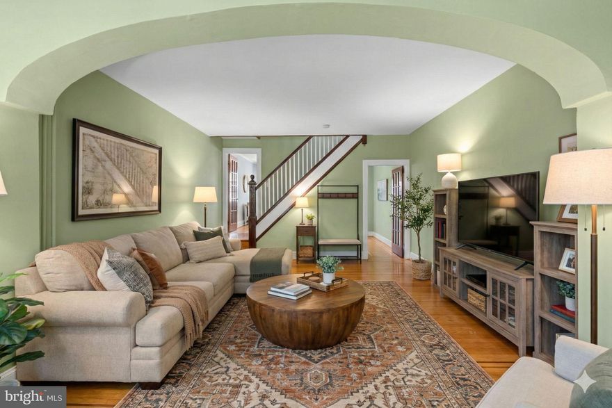 Welcom to 310 Drew Street! This beautifully maintained 2/3 bedroom, 1.5 bath townhouse blends timeless character with modern updates. Step inside to find a bright and spacious living room with high ceilings and gorgeous inlaid hardwood floors that flow throughout the main and upper levels. A set of charming original doors leads to the large formal dining room, perfect for entertaining. The crisp white galley kitchen features a gas stove and opens to a delightful screened-in sitting area between the home and the private garage. Upstairs, you'll find two generously sized bedrooms and an updated full bath. The partially finished basement offers a cozy family room or potential third bedroom, plus a laundry area with washer and dryer and ample storage space. Additional highlights include a one-car garage, updated vinyl double-pane windows, PVC main sewer line, updated electric panel and service cable (2019), roof on both the house and garage (2017), and water heater (2016). Located within walking distance to the park, Johns Hopkins Bayview Hospital, and local shopping. This home offers all the charm you love, paired with the updates you need.