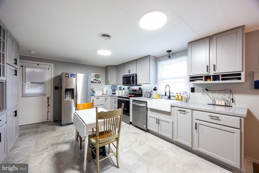 Multiple generations have enjoyed this property—and now it’s ready for a new chapter. This charming 1979 modular rancher (not a doublewide!) sits on 2.02 unrestricted acres, offering the perfect blend of privacy, space, and convenience. Recent updates include a new roof, HVAC system, and water heater, giving peace of mind for years to come.

Inside, the kitchen and dining area truly shine—beautifully renovated with new cabinetry, stainless steel appliances, a built-in buffet/china closet, coffee bar, and new flooring. Original hardwood floors, a cozy brick gas fireplace, and an unfinished walk-out basement reflect the solid construction and character of the era.

Outside, you’ll find a detached two-car garage/workshop, paved driveway with parking pads, a run-in shed, and plenty of room for pets, play, or even small-scale farming. Enjoy outdoor gatherings on the covered porch, surrounded by a partially wooded landscape. With no HOA or restrictions, and neighboring properties similarly free of covenants, you can bring your business, hobby farm, or multi-generational living dreams to life.

All this in a peaceful country setting just minutes from I-81 and local shopping and dining options. Come see the possibilities this unique property has to offer!