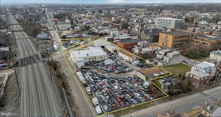 Welcome to 601 Concord Ave in Chester! An opportunity to own a wide-open commercial property ideal for fleet maintenance, service operations or automotive use with great access to I-95, Route 322, Business Route 13, and the NJ border. The property spans approx. 1.59 acres across four parcels (49-06-00311-01, 49-06-00310-00, 49-06-00311-00, & 49-06-00313-00) and has a fenced in secure lot with an alarm system and 36 on-site cameras. Zoned C-1/R, allows for a variety of commercial and mixed use possibilities. The facility features roughly 150-180 secured parking spaces, out front there are 10 lined spaces, and the parcel across the street has room for about 20 cars; offering ample capacity for large fleets or employee parking.
Inside, you will find a newly renovated office with heated floors, overlooking a spacious heated main shop powered by natural gas. The shop is fully equipped with 14 large drive-in overhead doors, 3 car lifts, welders, a car liner frame machine, detailing bay, Garmat Down Draft paint booth, paint prep station, paint mixing room, and an air compressor room with a Kaeser compressor. Additional features include a shop restroom, tire machine, and a storage and lunch room with direct views of the shop floor. Power capacity includes both 2 & 3 phase service (220 amp and 320 amp), supporting heavy duty operations. The building sits on a strong foundation capable of supporting 2-3 floors offering future vertical expansion potential. Conveniently located near major highways, the river front and community institutions, this property is a rare find for owner users or investors seeking a turnkey facility.
