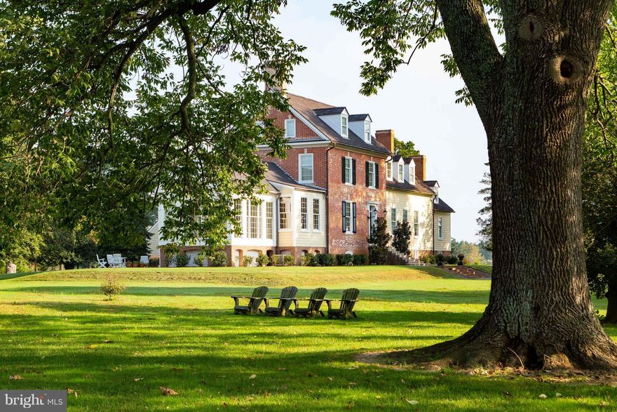 Located on the still waters of Town Creek in Oxford, Plimhimmon represents two distinct building periods dating from the late 18th and late 19th centuries, the oldest section being erected around 1767.  A true gentleman's farm, the current owners of this two-story home have set the standard for a historic restoration with painstaking detail in restoring the Georgian and Federal features.  Incorporating old-world craftsmanship, the manor has been brought to modern standards with such improvements as geothermal heating and cooling, elevator service from the basement through the second floor, and amenities expected of the waterfront estate market.  Sure to please the discerning buyer, Plimhimmon is one of a kind and an irreplaceable cornerstone of Talbot County's History. Quietly sited on 200 acres at the head of Town Creek, the farm has a dock with approximately four feet of water at mean low tide.  Statement trees and an appropriate blend of native landscaping and agriculture set the stage for country living.  A waterside guest cottage is situated nearby, offering those amenities for extended family and service help if needed.  An apartment over the garage, a carriage house renovated to provide studio/office accommodations, and a generously proportioned barn compliment the farm providing adequate facilities for the hobby enthusiast and outdoorsman alike. Wildlife and waterfowl abound among this historic staging area.  Long respected for migratory waterfowl, this area is known for epic numbers of migrating Canada geese, and the natural shorelines provide extensive habitat for shorebirds and ducks.  Shoreline buffers and restored wetlands provide a haven for many upland game species, as well as a fifty-acre wooded parcel offering a host of opportunities for the naturalist. Located just outside of Oxford, Plimhimmon is twelve miles from Easton / Newnam Field, providing jet service and facilities adequate for private aviation.  BWI is within an hour and a half, as well as Reagan National putting this farm within reach of the commuter and offering ease of access as a weekend retreat.