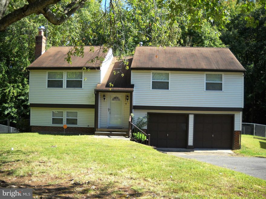 Well maintained & ready to move in -Freshly painted, new carpet & kitchen appliances -Bathrms  been up-dated -FR w/brick profile fireplace (wood stove conveys) -Washer & dryer convey -Gas heat, water heater & dryer (also 220 plug for elec. dryer - Over-sized 2 car garage -Large free-standing deck -Fenced yard -Backs to woods -Located at the end of a  cul-de-sac -Convenient  to I95 and shopping.