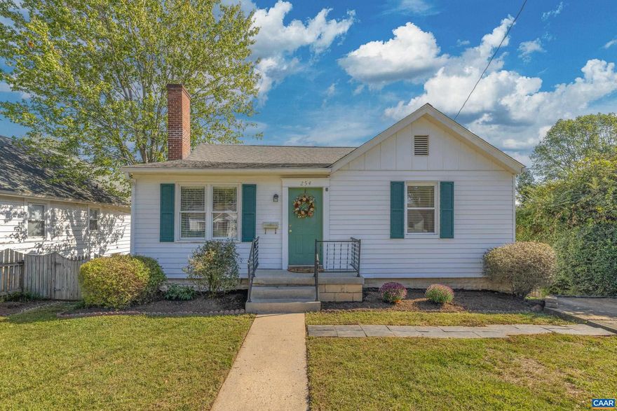 Fall in love with this storybook 1930s bungalow just steps from UVA! This home blends timeless charm with modern updates, featuring original hardwood floors, a light-filled living room with a cozy fireplace, and sunny bedrooms that feel instantly welcoming. The large, renovated kitchen offers generous cabinet space, updated appliances, and a huge dining area perfect for hosting family and friends. The home sits on a beautifully landscaped double lot, offering rare extra space for outdoor living?or the perfect opportunity to expand the current footprint. Under the city?s R-A zoning, the lot also presents a fantastic opportunity to add another dwelling (s), making this property as versatile as it is charming. With sunny garden areas, off-street parking, and unbeatable proximity to the University, this home offers a wonderful blend of character, convenience, and potential.,Wood Cabinets,Fireplace in Living Room
