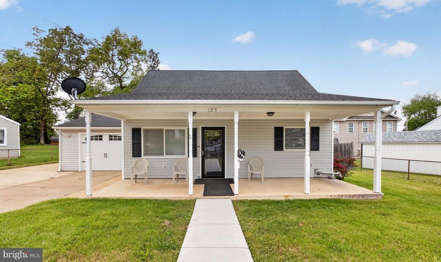 Covered front porch, oversized driveway, and value-add potential inside.
You’ll find 3 bedrooms and 1.5 baths in a home that’s been well-maintained over time and ready for your personal updates. As you walk in, you’re greeted by a spacious living area anchored by a brick fireplace and large windows, giving the home a bright and open feel.
In the kitchen, you’ll have ample cabinet storage and counter space, with the flexibility to update finishes or rework the layout to match your vision. 
Upstairs, there are well-sized bedrooms with solid closet space. The full bath is clean and functional, offering a great starting point for future upgrades.
You’ll appreciate the fenced yard with room to spread out, whether you’re hosting, gardening, or letting pets play freely. A detached structure gives you extra storage or workshop possibilities, while the garage and extended driveway make parking easy for multiple vehicles.
The home is close to the Manassas Park Community Center, Manassas Park Dog Park, Stonewall Park, and Fairmont Park. Shopping, dining, and daily conveniences are nearby with quick access to Route 28 for commuting throughout Northern Virginia and into DC.
If you’re looking for a home you can live in now and improve over time, this is a strong opportunity.