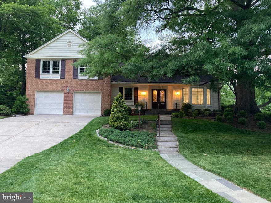 Price Just Reduced    on one of the most spacious brick colonials in the highly sought-after Old Farm Community!  This Queen Anne model features 5 bedrooms, with an optional 6th bedroom, 4 full and 1 half baths, 2 fireplaces and a 2 car garage.  Renovations include a finished basement, refurbished hardwood floors and fresh paint throughout.  MAIN LEVEL: This spacious floorplan includes an elegant foyer, grand living room with fireplace, formal dining room, huge family room with stone fireplace, and a 6th bedroom/study with an adjacent half bath. The large kitchen contains a walk-in pantry, custom maple cabinetry, granite countertops, center island, and seating area with a panoramic bay window overlooking a tranquil garden.  The backyard brick terrace, accessible from the kitchen,  is walled in by mature trees and provides complete privacy. UPPER LEVEL: The upper level features an oversized primary bedroom suite that includes a full bathroom, dressing room, walk-in closet, and sitting room.  Additionally, this level has 4 spacious bedrooms, 2 full bathrooms, and a large attic storage space. LOWER LEVEL: The lower level has been renovated to include a huge recreation room, laundry room, bonus room, storage/utility room, and full bathroom.  Close to the metro, shopping, dining, Pike & Rose, downtown Bethesda, I-270 & I-495, and The District! This one will not last!