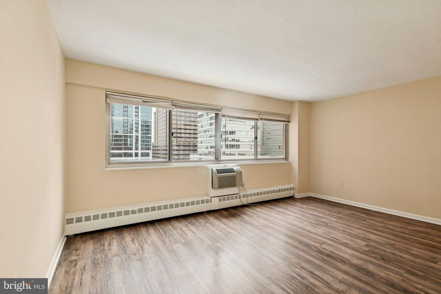 Enjoy convenient city living in this updated studio residence located in Rittenhouse Square. This home boasts beautiful, gleaming floors, ample storage space, and a wall of oversized windows that fill the interior with an abundance of light. The kitchen features white raised-panel cabinetry, a gas range, and chrome fixtures. The bathroom showcases ceramic tile work, a sink with storage vanity, and a tub shower combo with tiled surround. A bonus oversized walk-in closet or office nook completes this comfortable residence at Riverwest. Condo fees include ALL utilities (gas, water, and electricity), access to a state-of-the-art fitness center, and a 24-hour lobby attendant. Convenient garage parking is also available on-site for an additional fee. Perfectly located in desirable Rittenhouse Square, this pet-friendly residence at Riverwest is in the heart of Center City with fine dining, the park, one-of-a-kind shopping, exciting nightlife, theaters, and world-renowned cultural destinations. The campuses of Penn and Drexel, 30th Street Station, and major hospitals are all just minutes away.