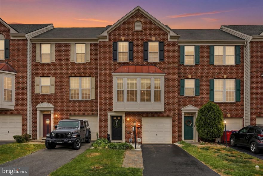 Move-in ready brick townhome in desirable Windmill Crossing featuring a beautifully updated primary bathroom shower, spacious layout, and a large Trex deck perfect for relaxing or entertaining.
Come see this well-maintained 3 bedroom, 2.5 bath townhome offering three finished levels of living space in a convenient Charles Town location. The main level features an open-concept kitchen and living area with great natural flow for everyday living and gatherings. Just off the kitchen is a flexible rear sunroom/nook that makes a perfect home office, playroom, workout space, reading area, or additional sitting room, with direct access to the newer Trex deck.  The finished lower level offers a spacious rec room/family room ideal for movie nights, hobbies, gaming, or additional living space, along with access to the one-car garage. Upstairs, the primary suite stands out with its beautifully remodeled shower and updated bathroom feel. One of the best features of this home is its location within the community. Tucked toward the back of the neighborhood for reduced through traffic, the property is also located near a large community green space and playground area, giving homeowners extra outdoor space to enjoy right outside their door. Need parking? This section of the neighborhood offers multiple nearby guest parking areas in addition to the garage and driveway, making entertaining and daily living much easier. Nice bonus and a time saver...the HOA treats and cuts your grass.  Conveniently located near shopping, dining, commuter routes, and historic downtown Charles Town and Harpers Ferry, this home offers low-maintenance living with extra space both inside and out. Updates: New within 5 years... front living room windows, water heater, HVAC, primary shower, washer, dryer, kitchen appliances, and 16' x 24' Trex deck. Come see how great this home is.