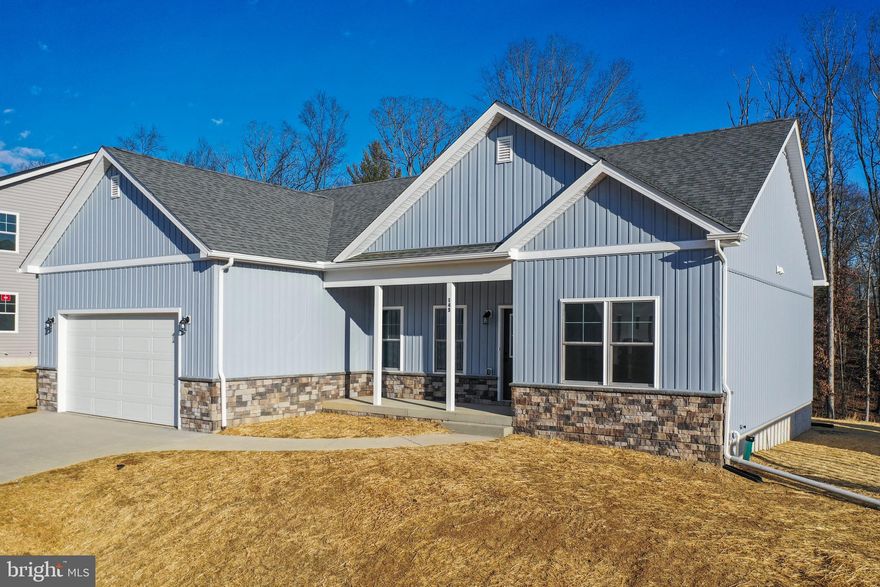 Introducing the 1441 Rancher D by Warfield Homes at Middle Creek Vistas. Have you been dreaming of a home that offers one-level living? Perhaps you have been strategizing to make a plan to retire in place. Warfield Homes Inc. has been building custom homes in the Northern Shenandoah Valley for over 30 years. You'll love the openness of the floor plan, the 9' ceilings & the luxury vinyl plank flooring. The kitchen is beautifully finished with soft close cabinets, stainless steel appliances & upgraded countertops. This floor plan features a walk-in pantry. The primary suite features a walk-in closet, dual sinks & a custom
shower with floor to ceiling tile. A $2,000 closing cost credit & a free appraisal are available with the use of the builder's preferred lender. The completion time frame is approximately 120 days from the issuance of the county building permit.